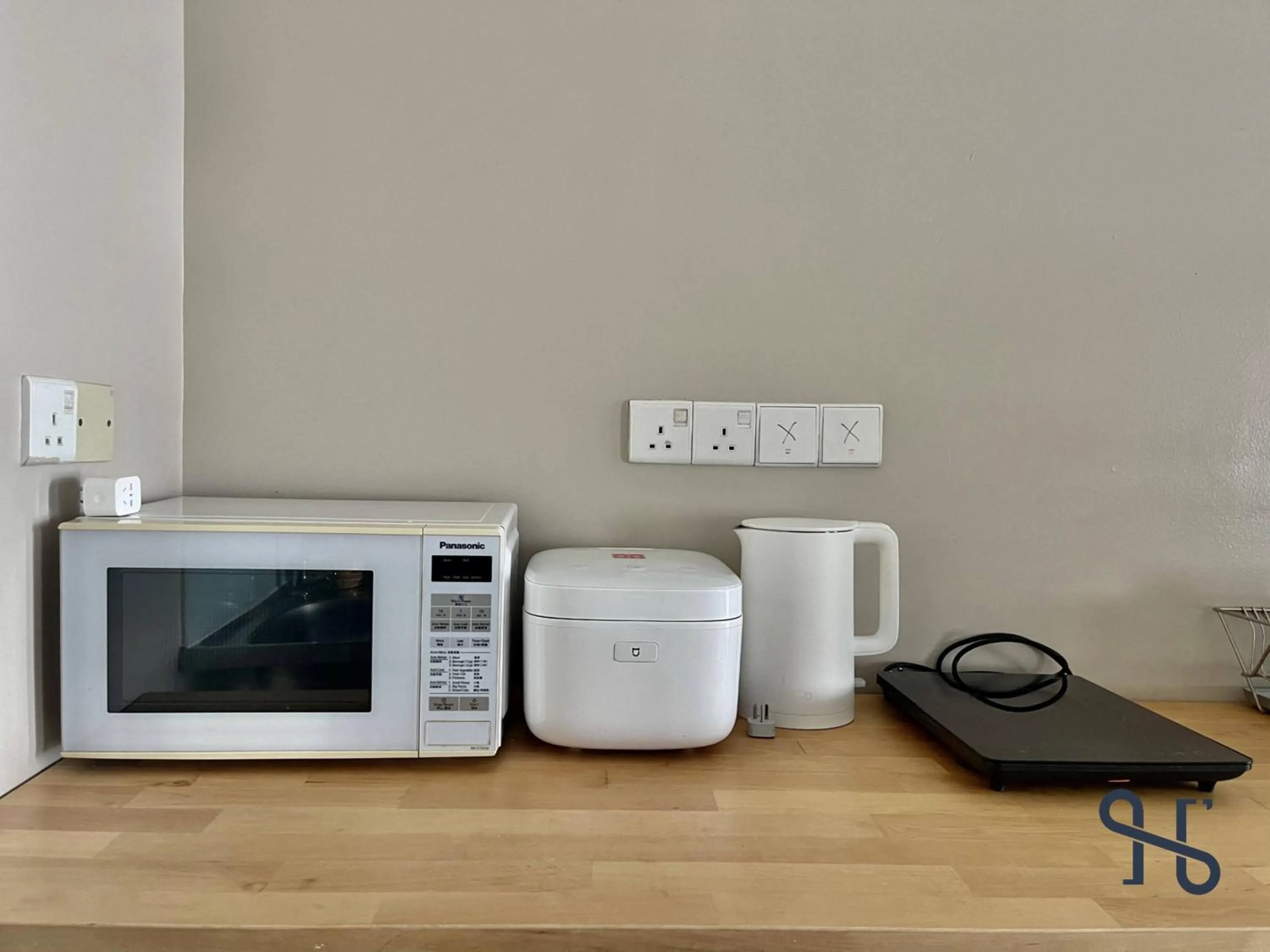 Kitchen or kitchenette in Homesuite' Home at Riverson Soho