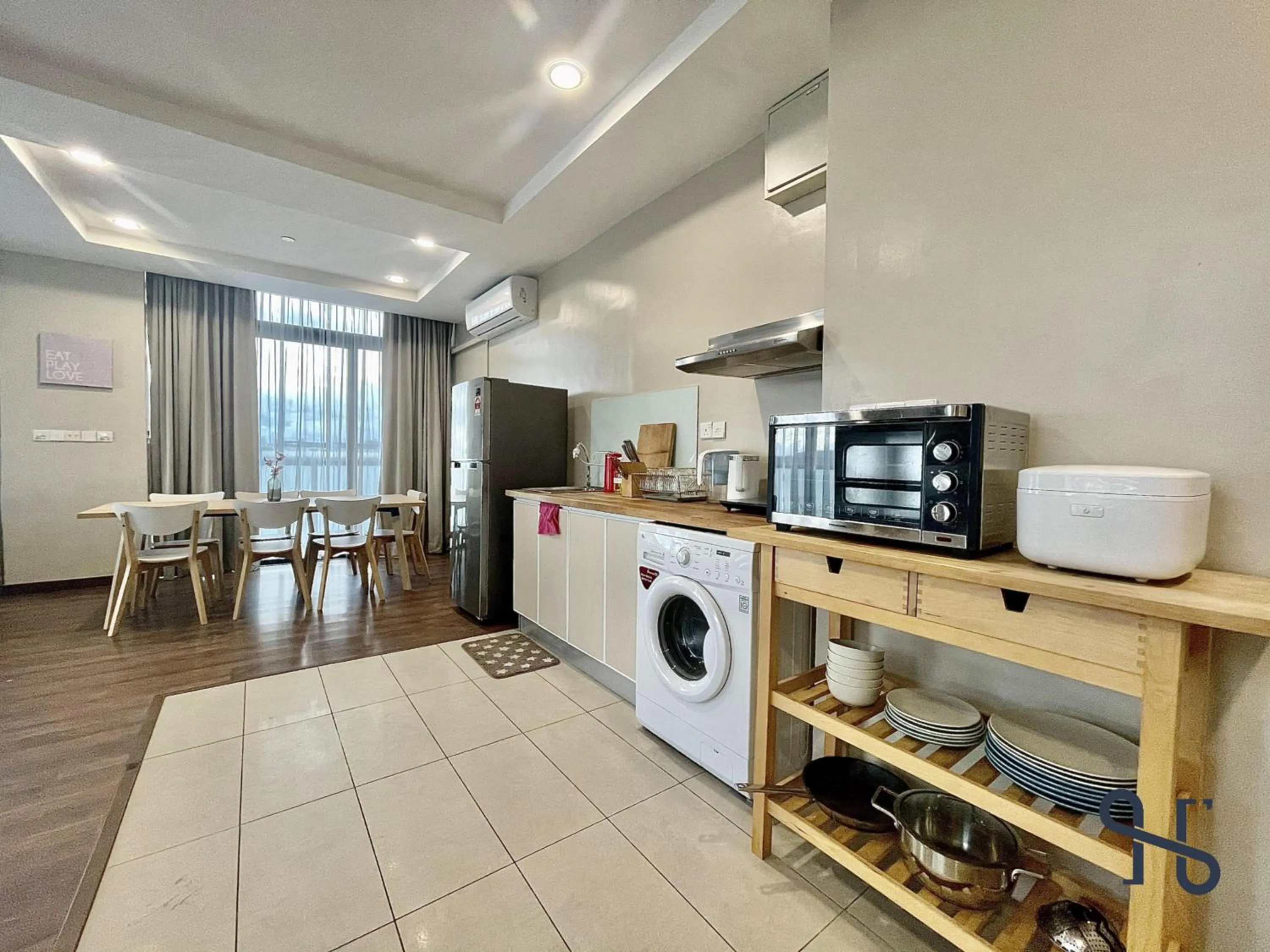 kitchen in Homesuite' Home at Riverson Soho
