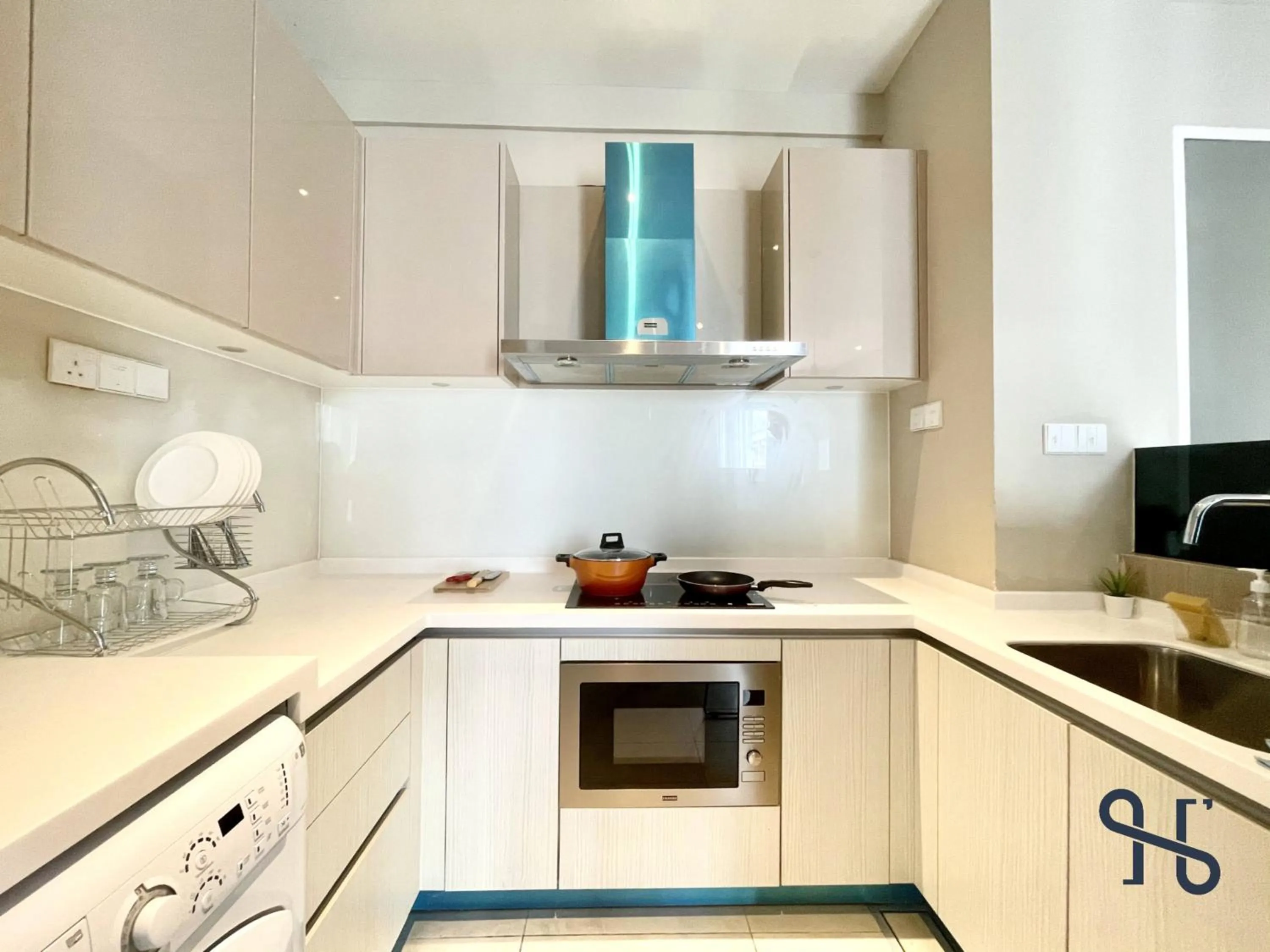 Kitchen or kitchenette in Homesuite' Home at Riverson Soho