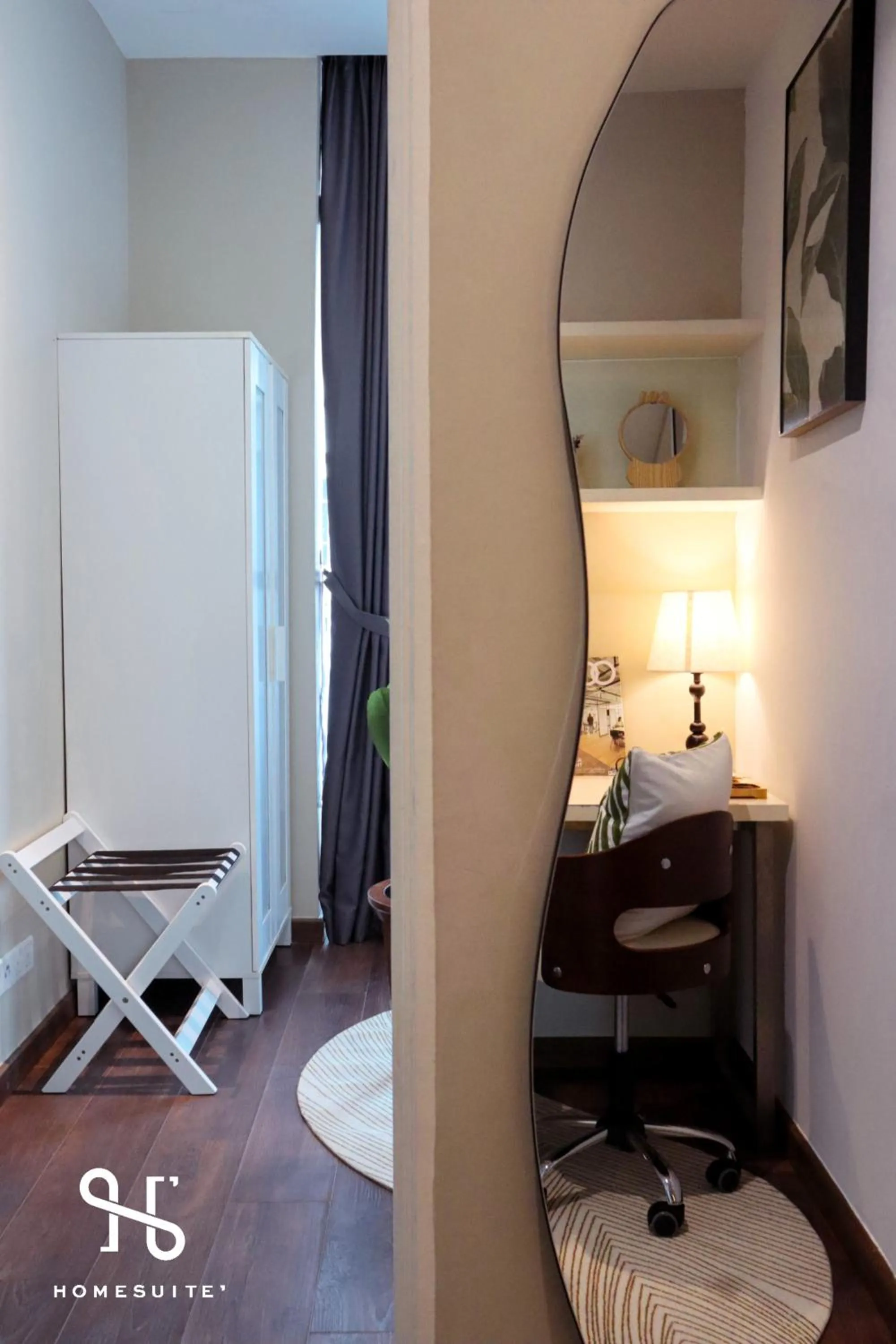 Photo of the whole room in Homesuite' Home at Riverson Soho