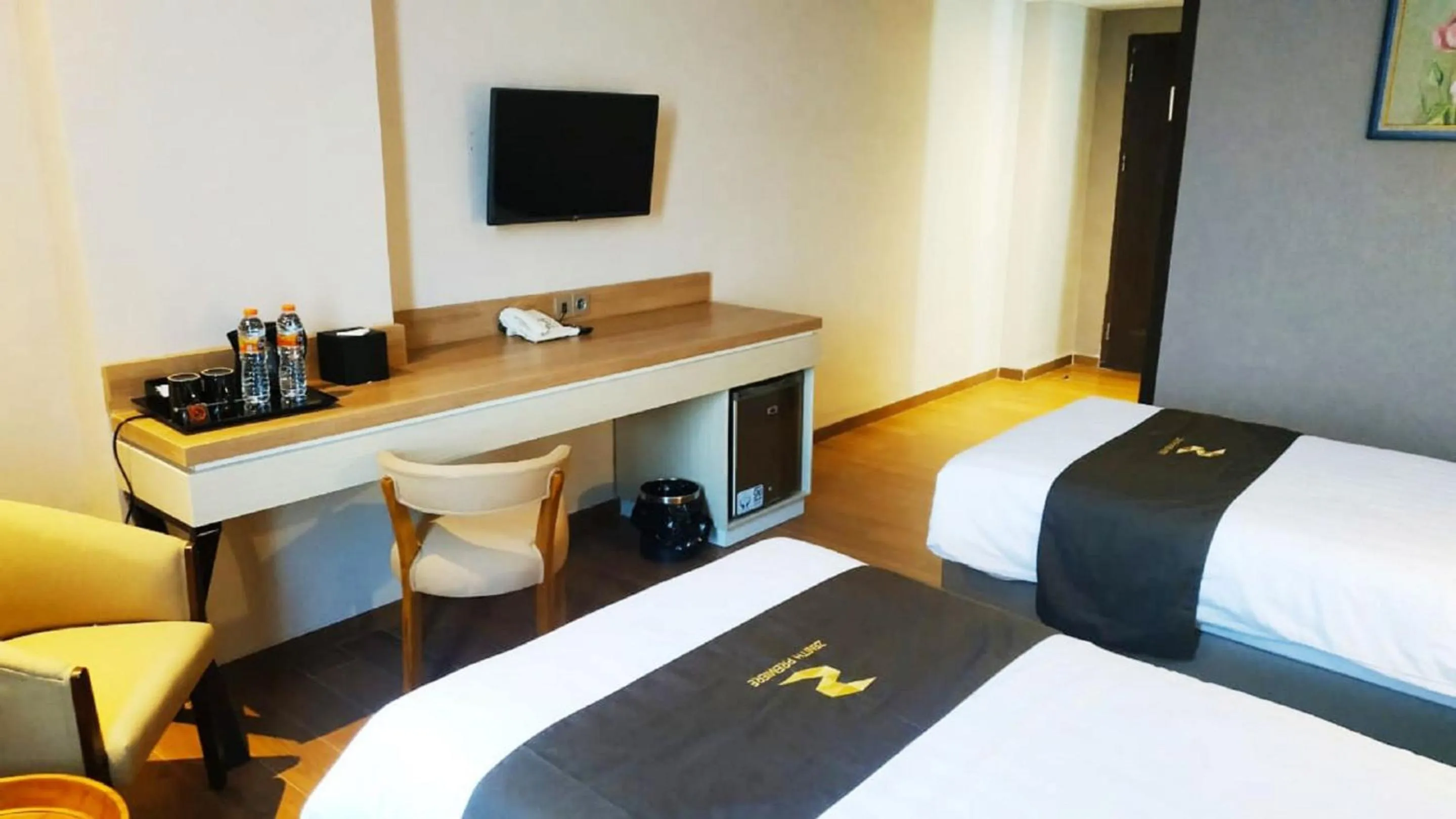 Bed in Zenith Premiere Hotel Baubau