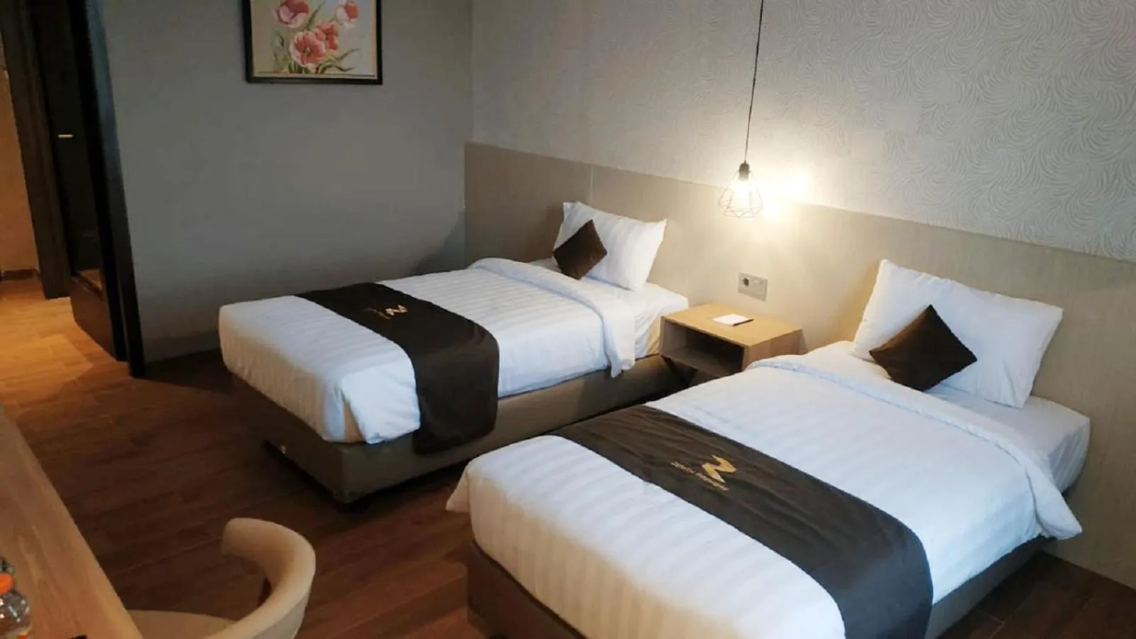 Bed in Zenith Premiere Hotel Baubau