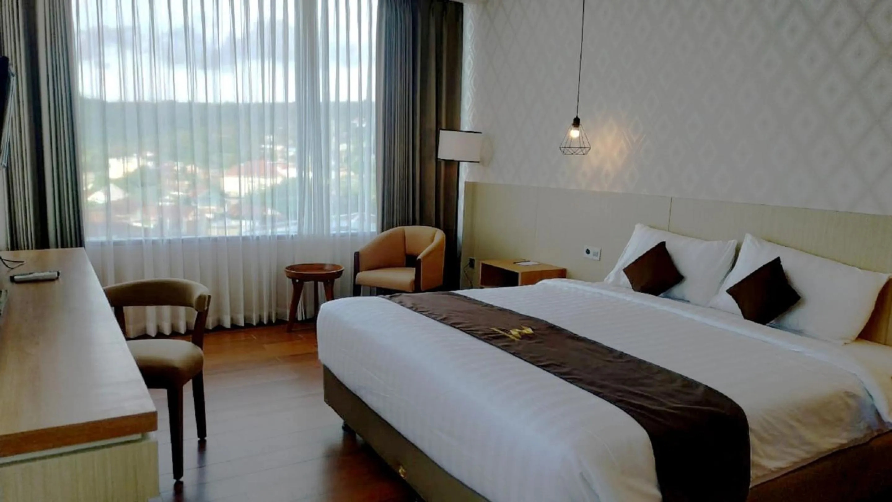 Bed in Zenith Premiere Hotel Baubau