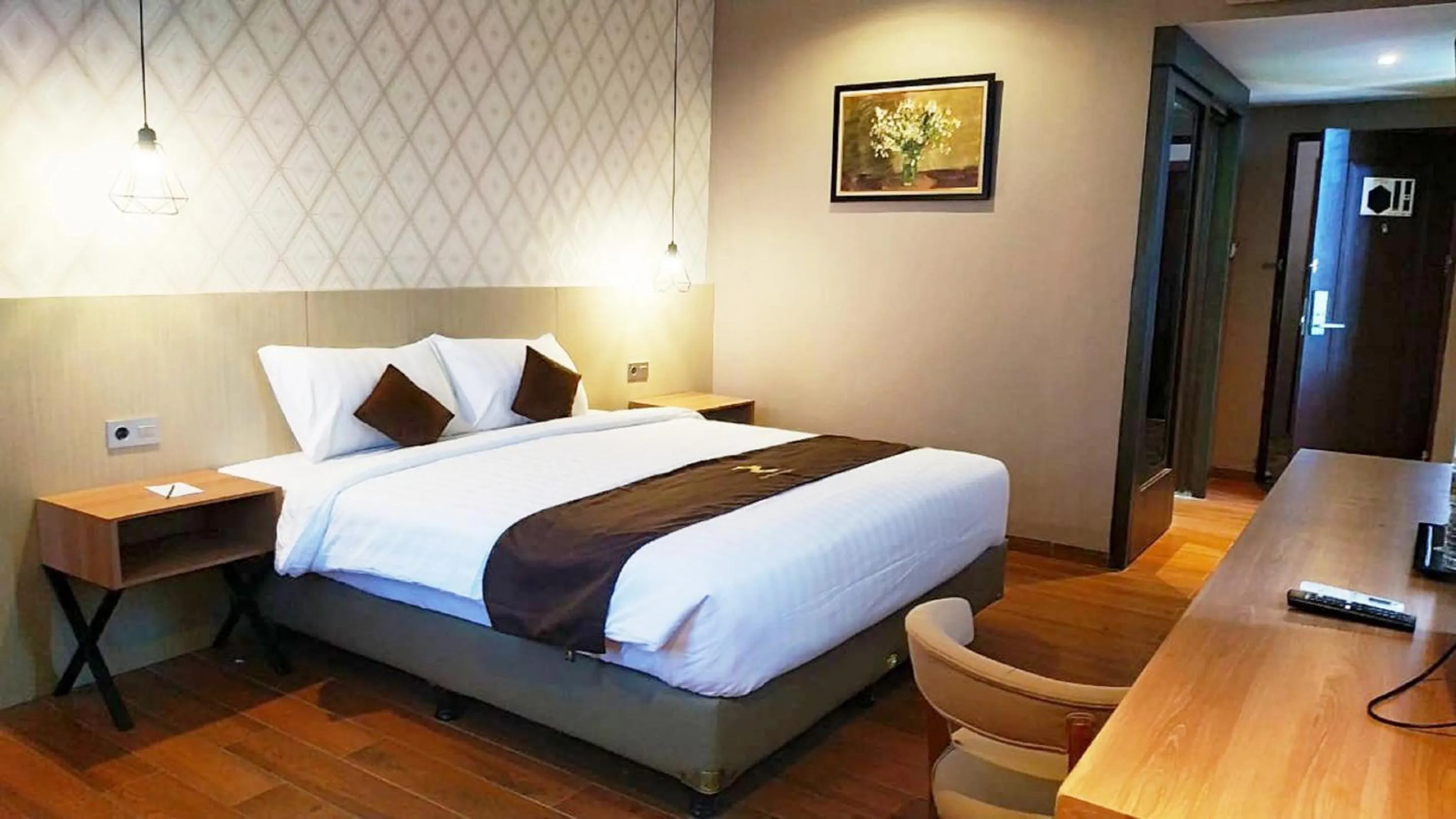 Bed in Zenith Premiere Hotel Baubau