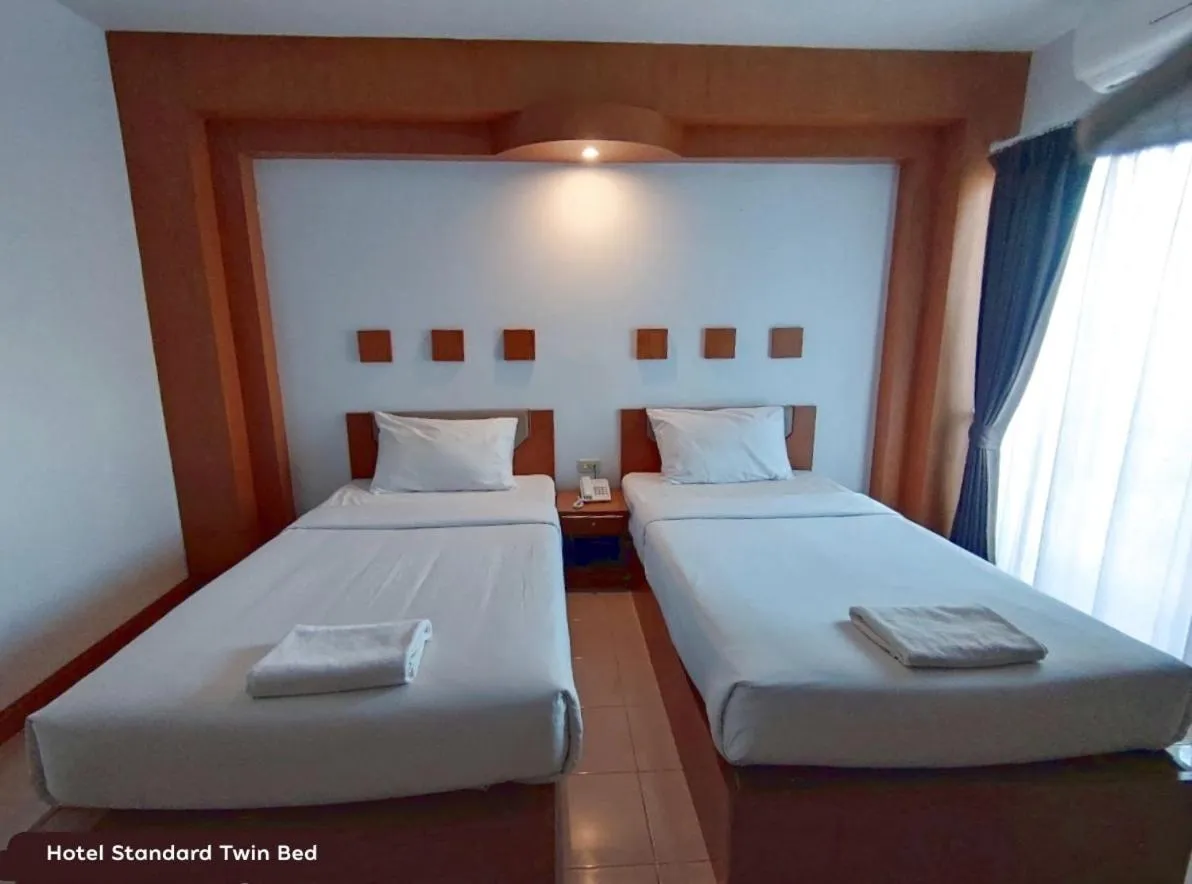 Bed in Areena Resort and Hotel Uttaradit