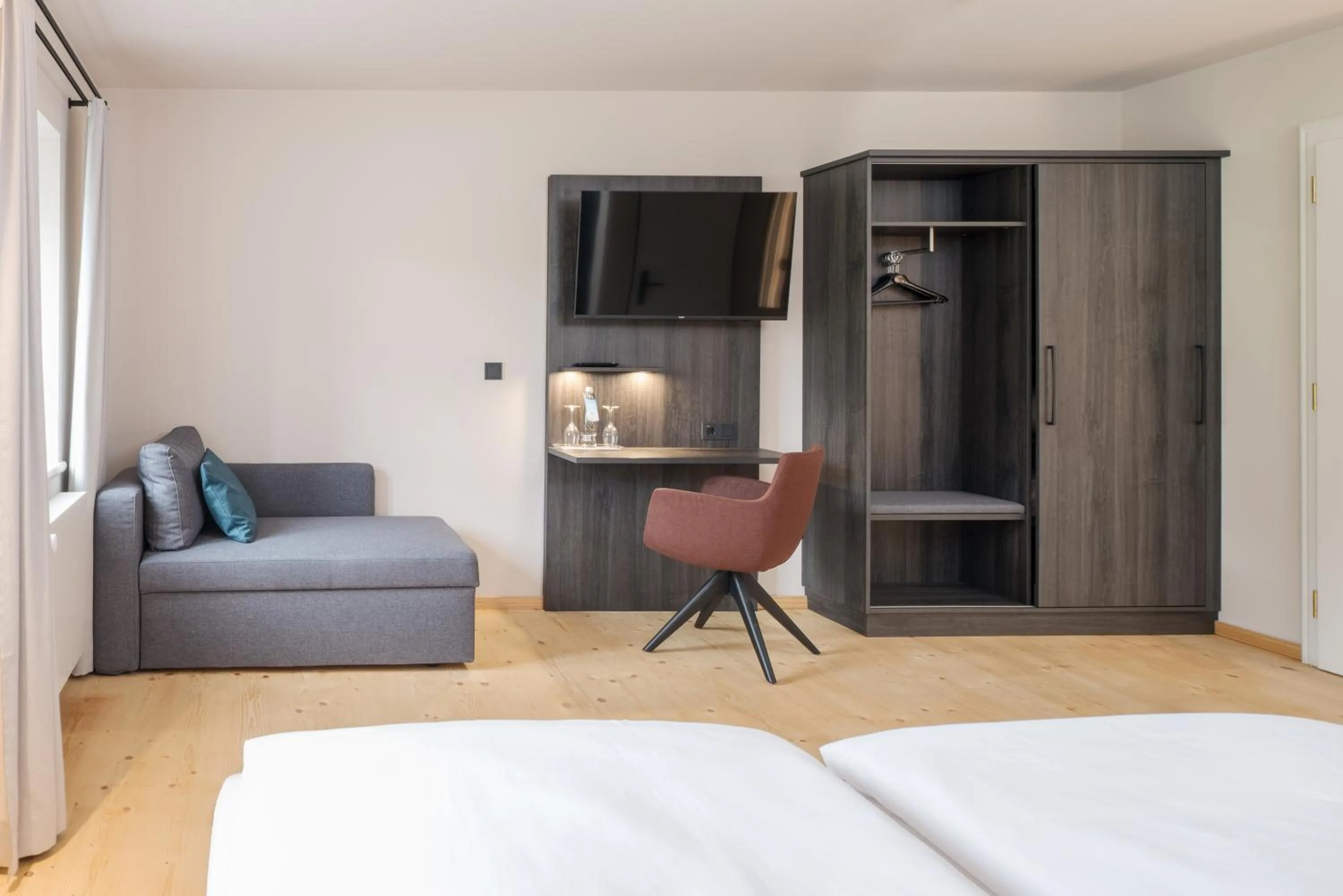 Photo of the whole room, Bed in Hotel Aiterbach am Chiemsee