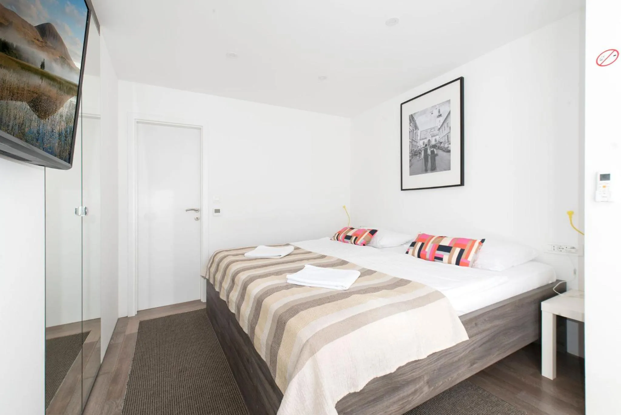 Bed in Tia Apartments and Rooms