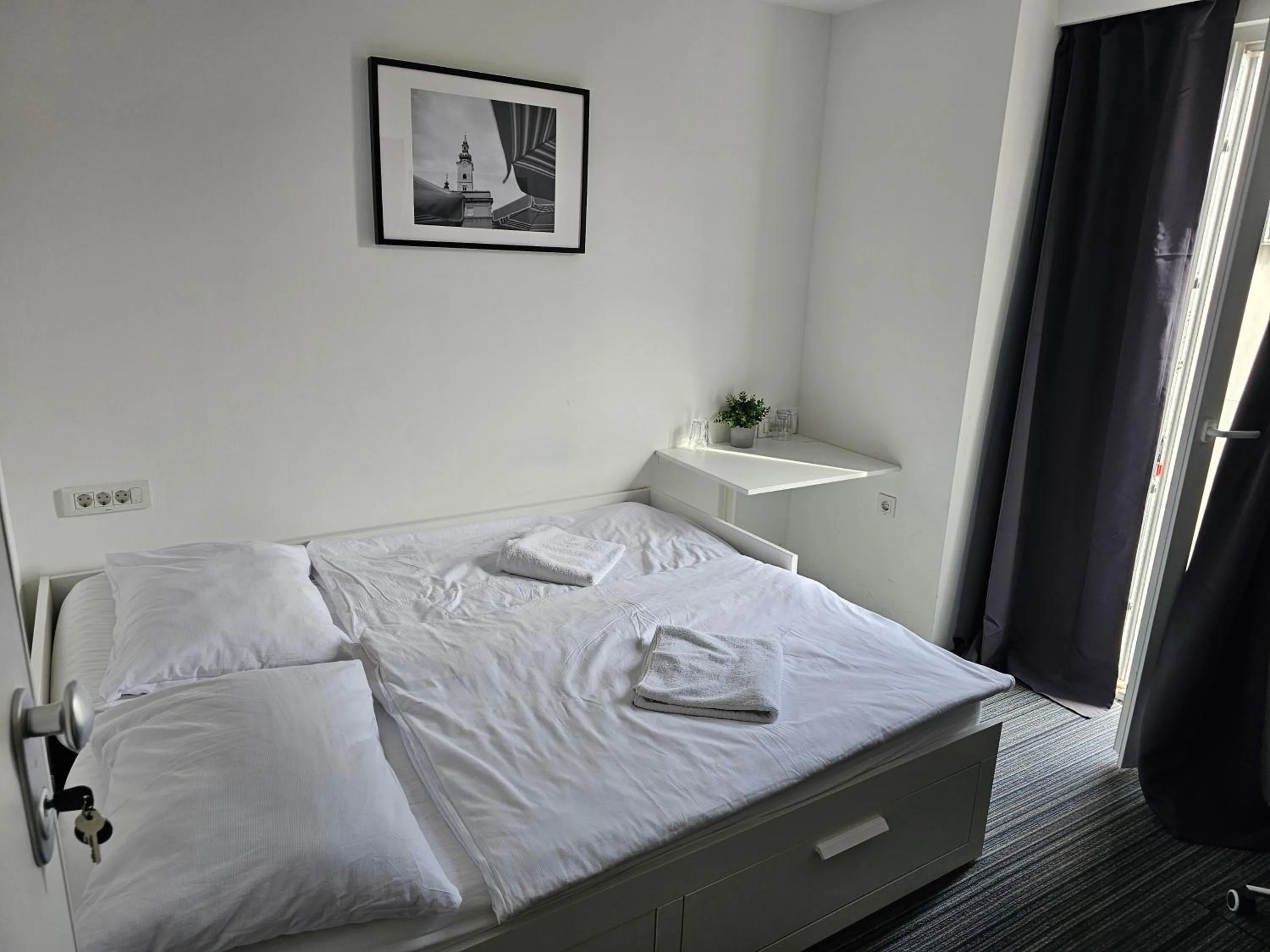 Bed in Tia Apartments and Rooms