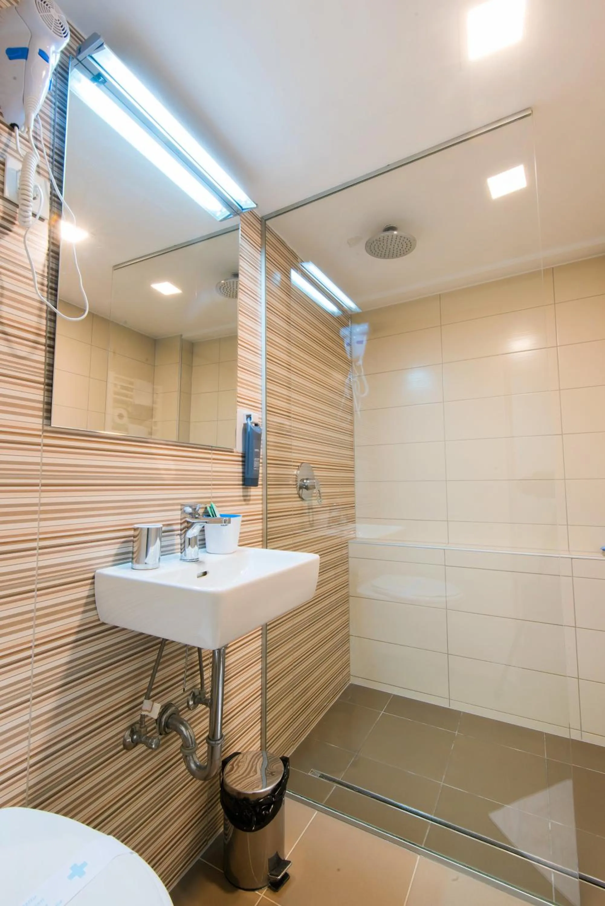 Bathroom in Tia Apartments and Rooms