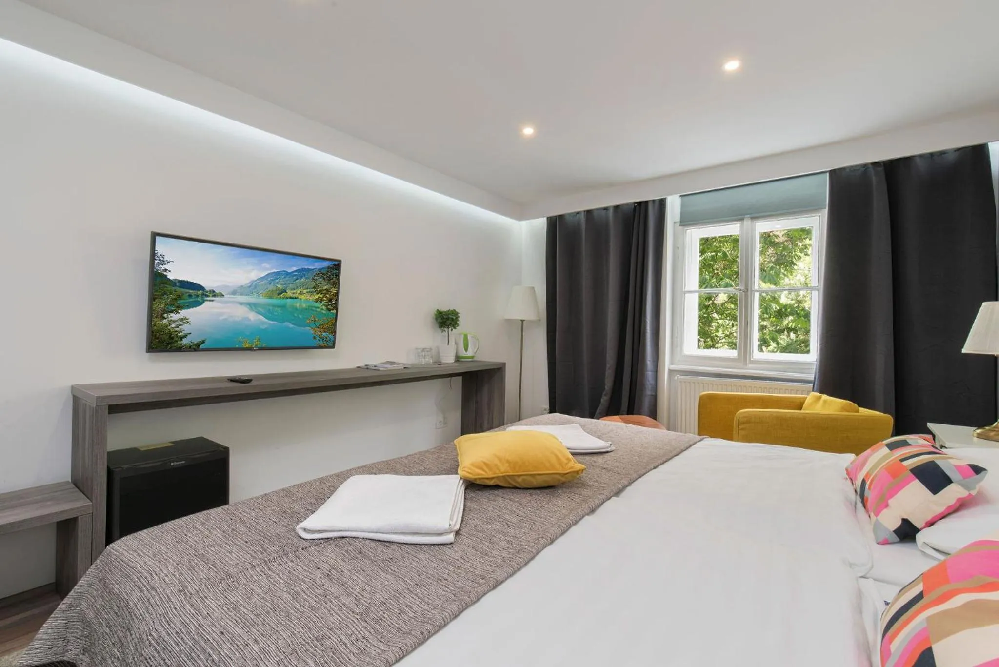 Bedroom in Tia Apartments and Rooms