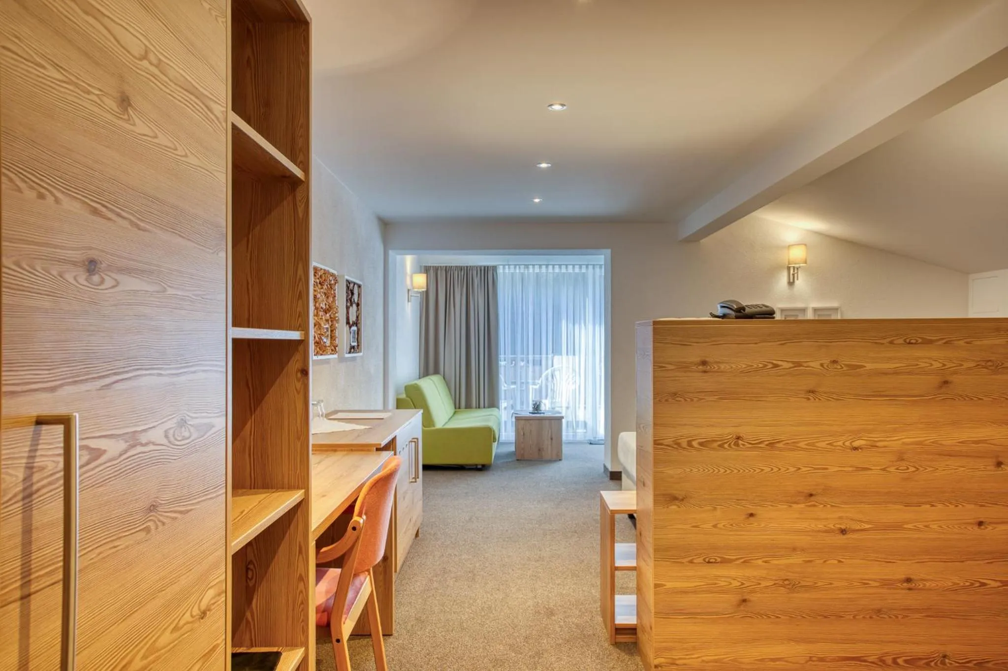 Seating area, Bed in Hotel Erika