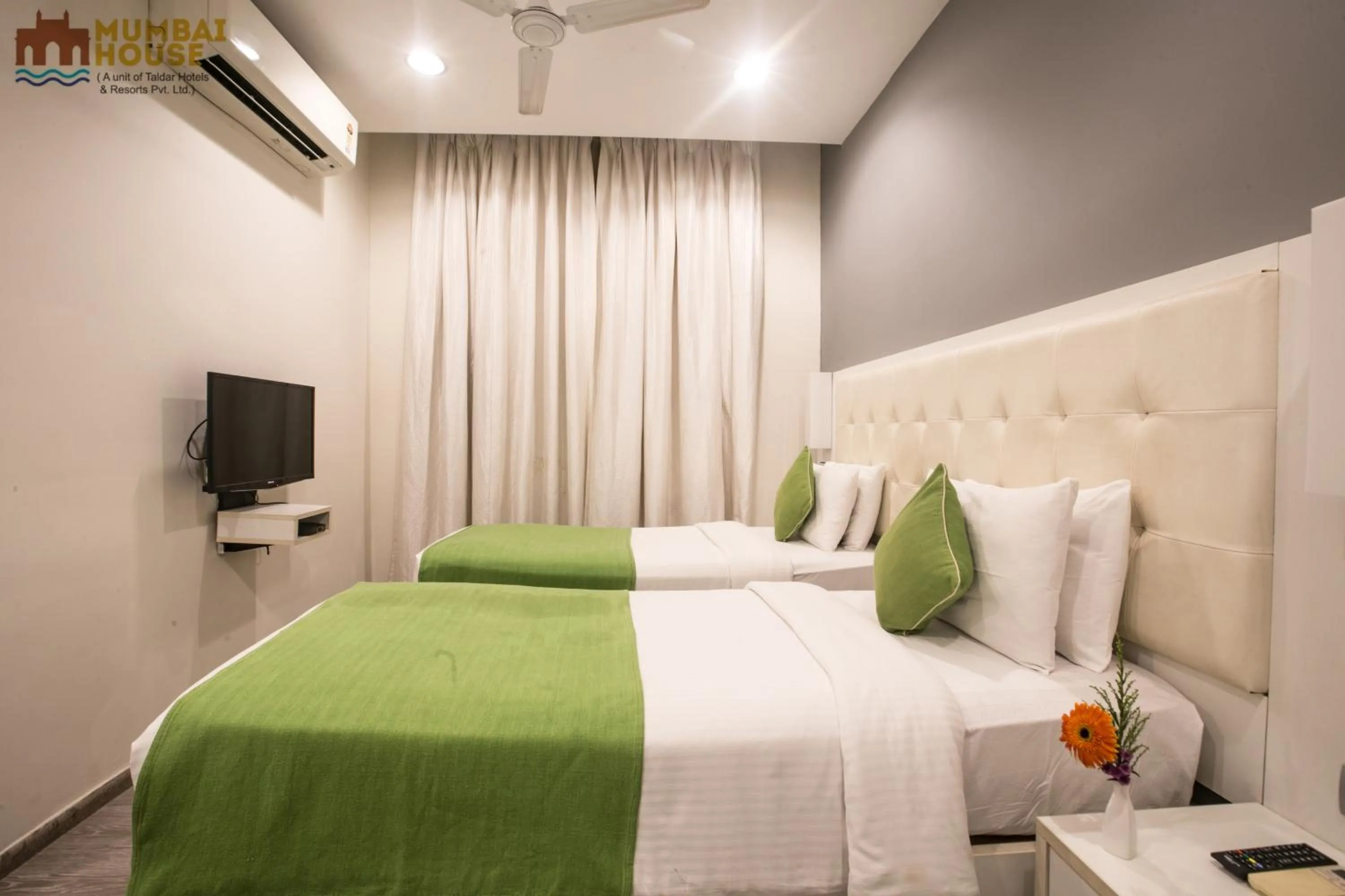 Photo of the whole room, Bed in Hotel Mumbai House Airoli, Navi Mumbai