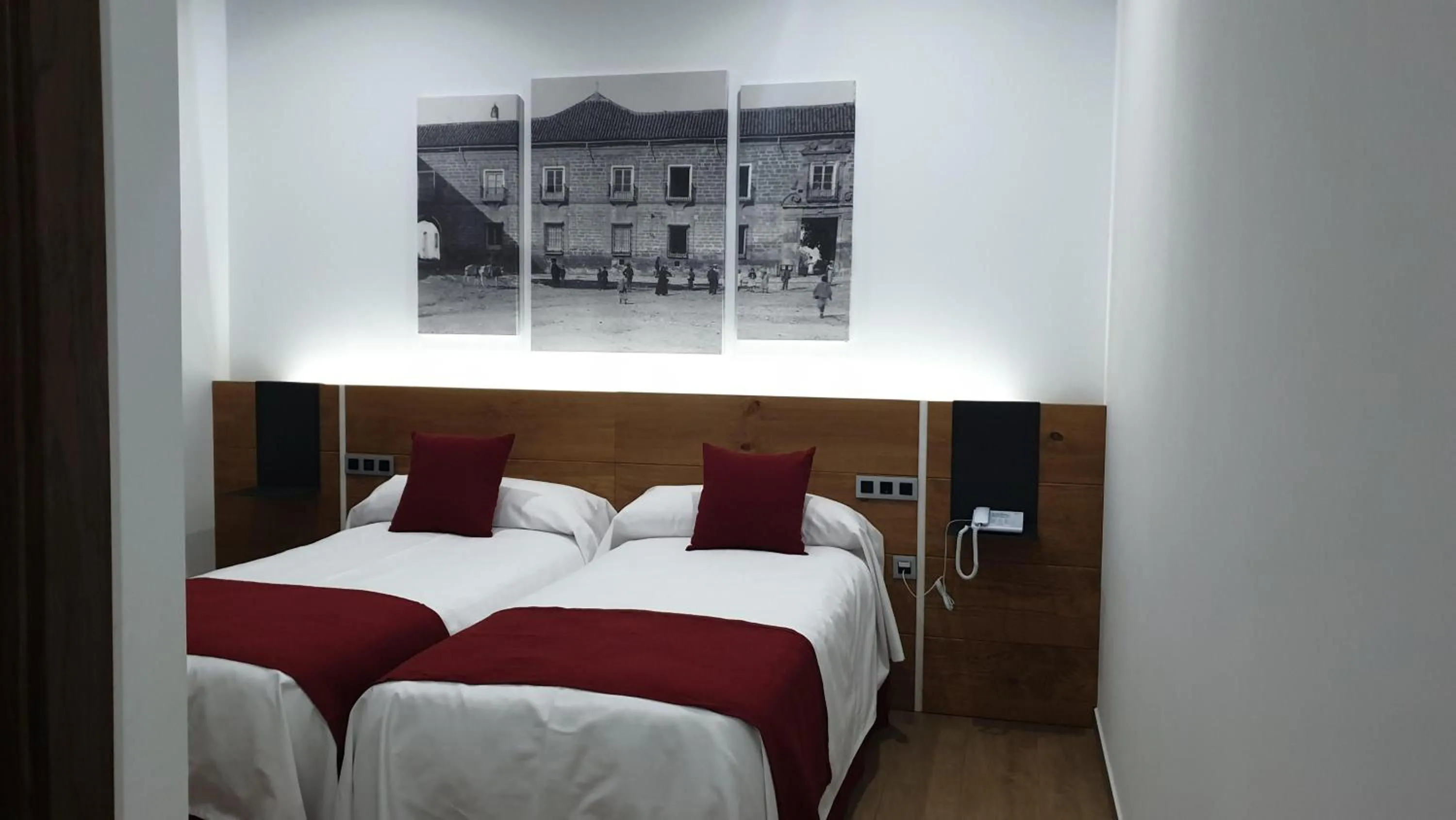 Bed in HOTEL DON RAMIRO