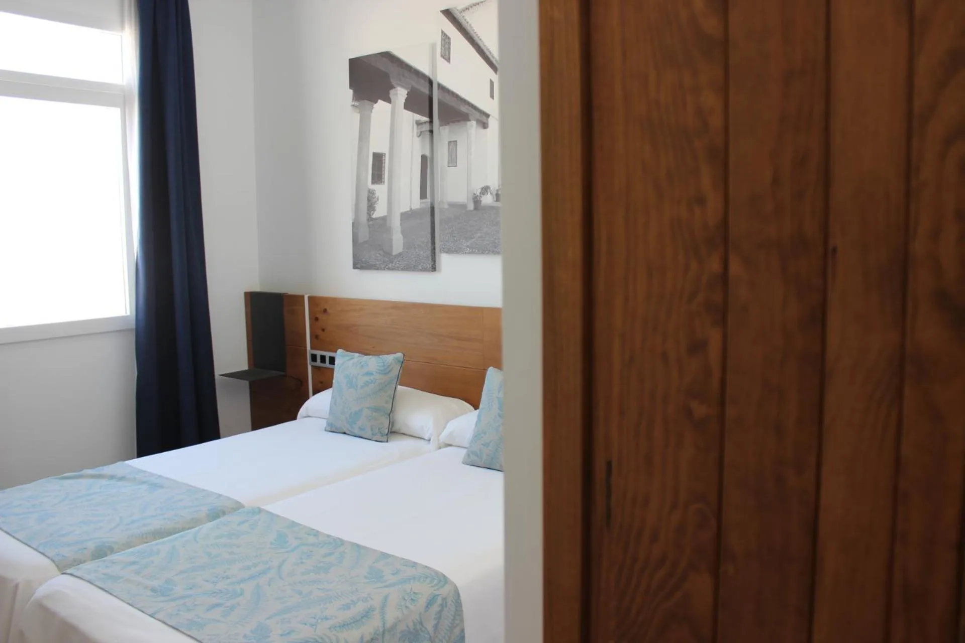 Bed in HOTEL DON RAMIRO