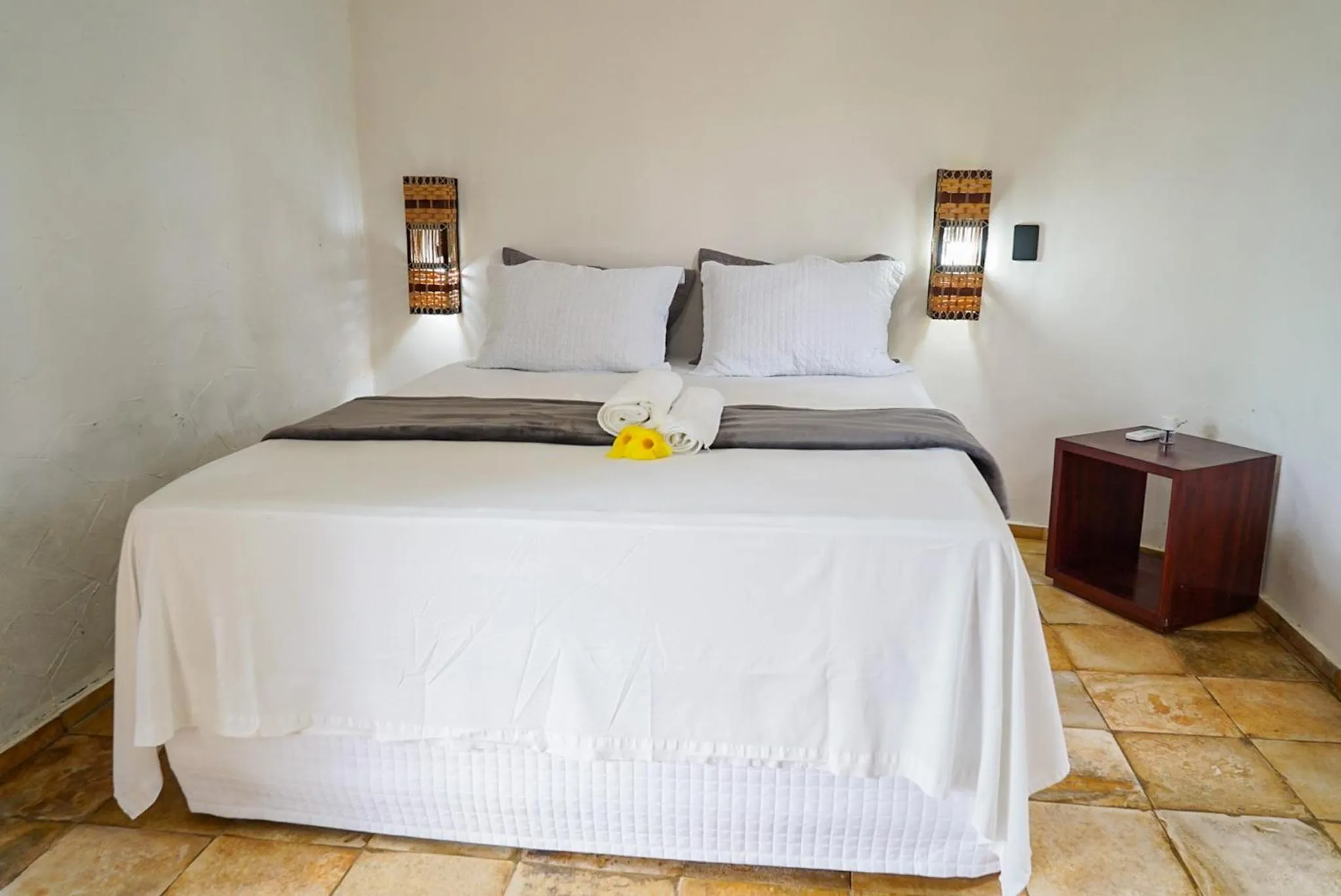 Bed in Pousada Rota dos Ventos