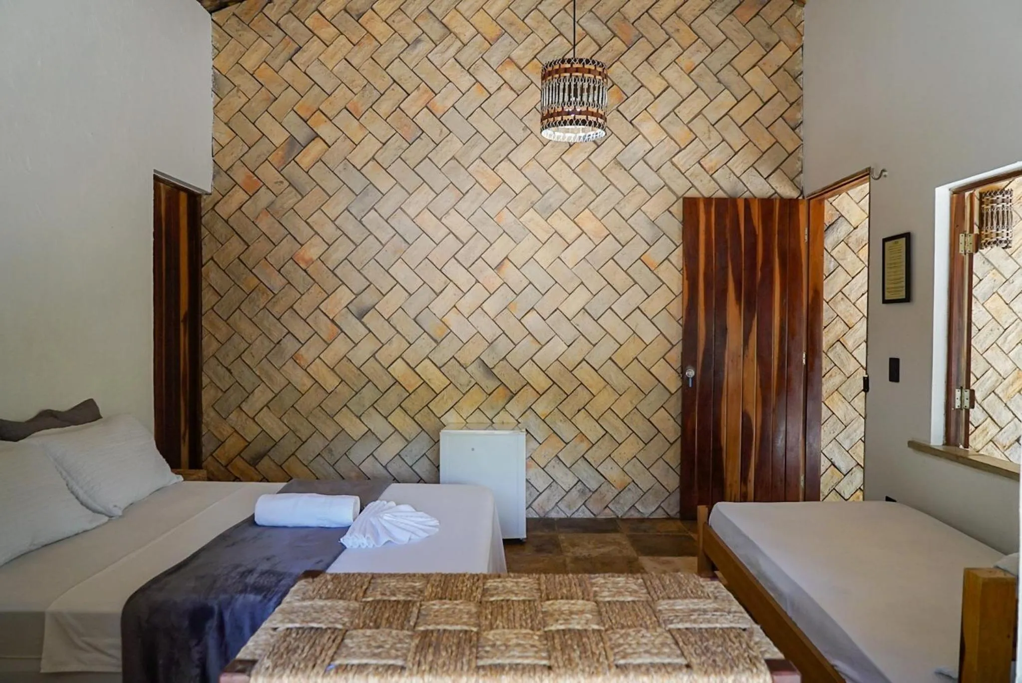 Bed in Pousada Rota dos Ventos