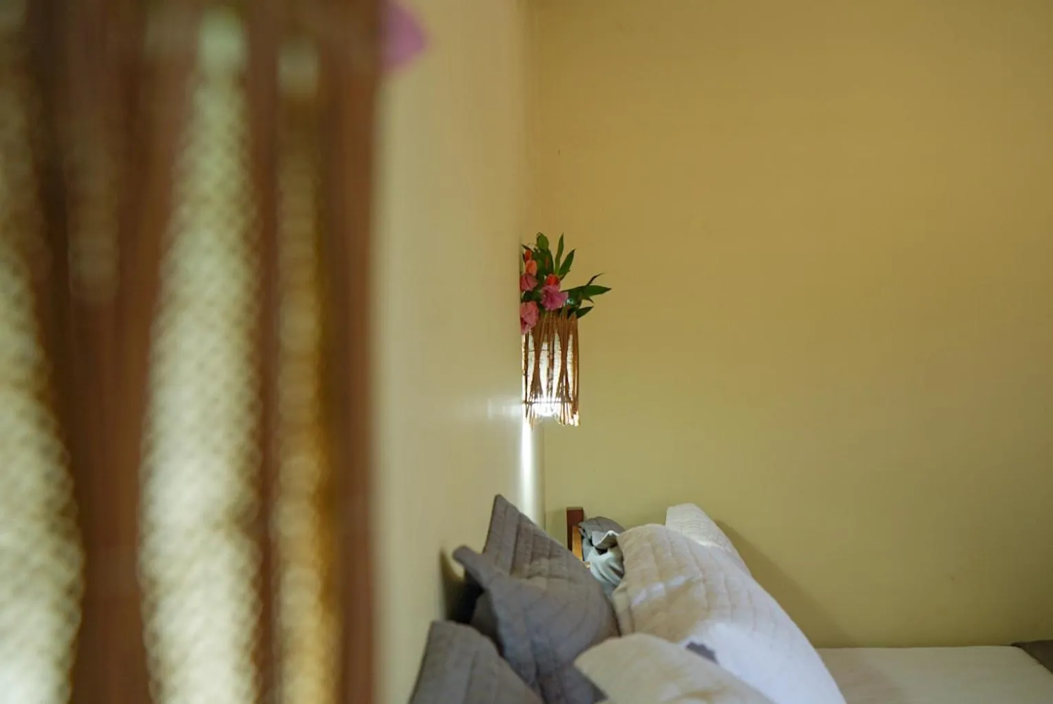 Bed in Pousada Rota dos Ventos