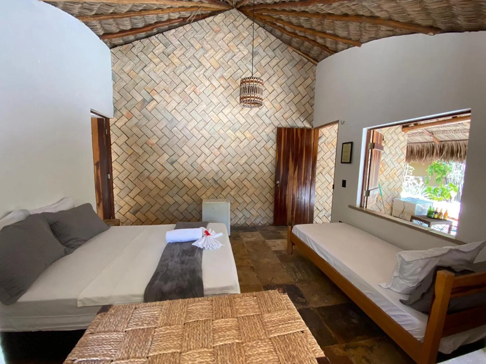 Bed in Pousada Rota dos Ventos