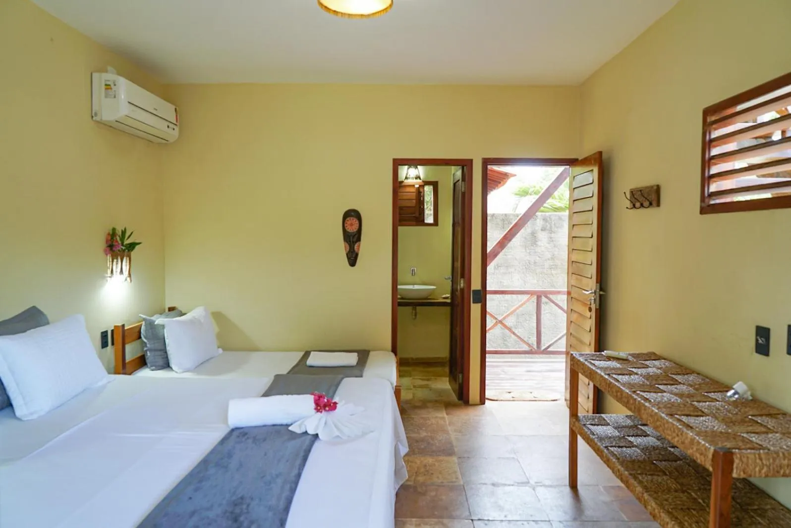 Bed in Pousada Rota dos Ventos