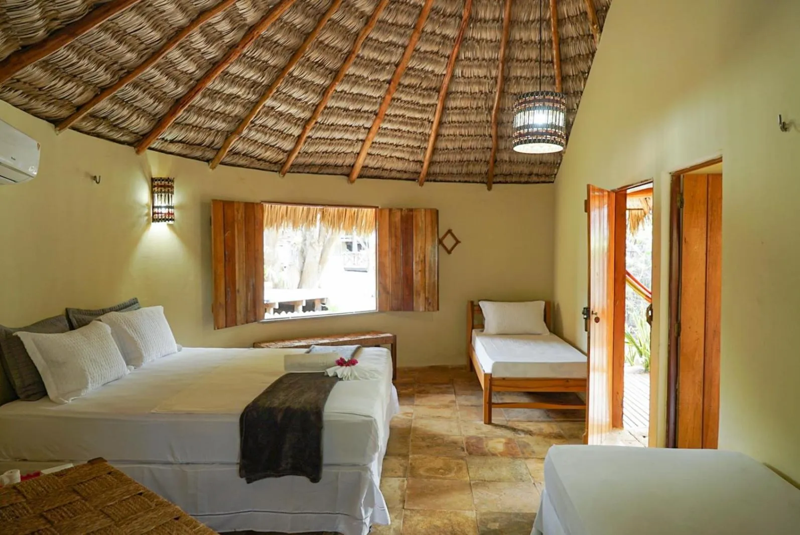 Bed in Pousada Rota dos Ventos