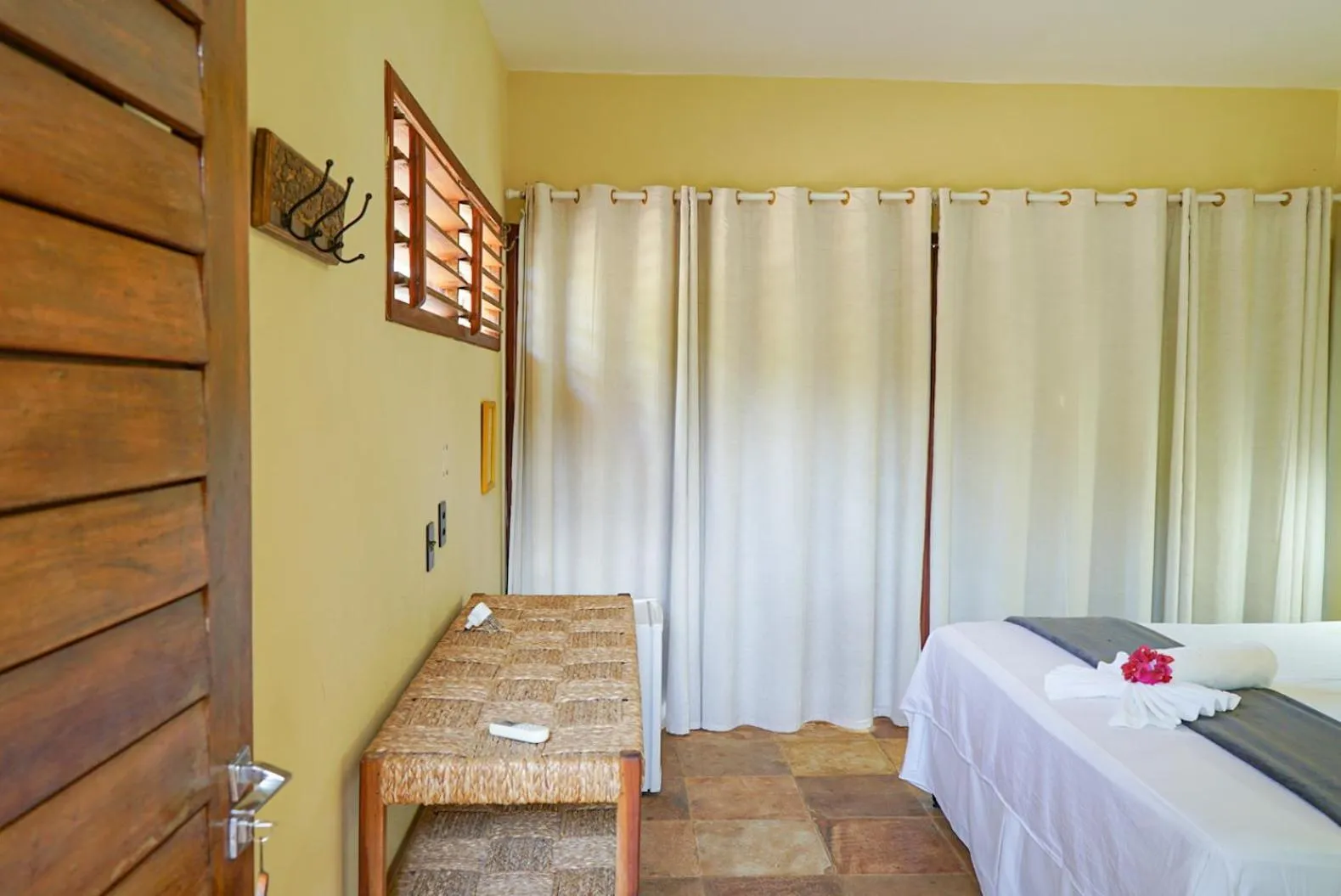 Bed in Pousada Rota dos Ventos