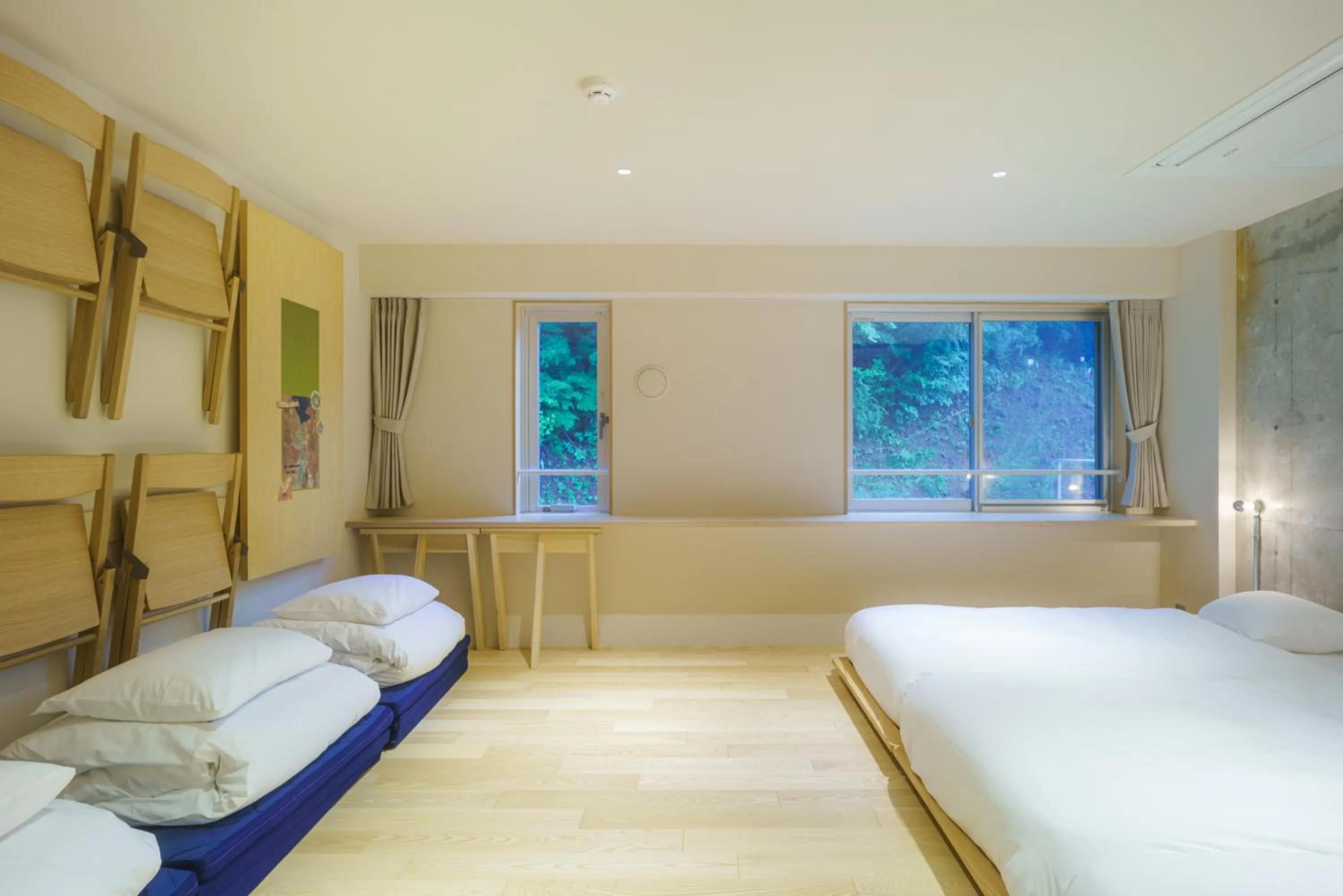 Bed in TAKAONE ACTIVITY＆STAY