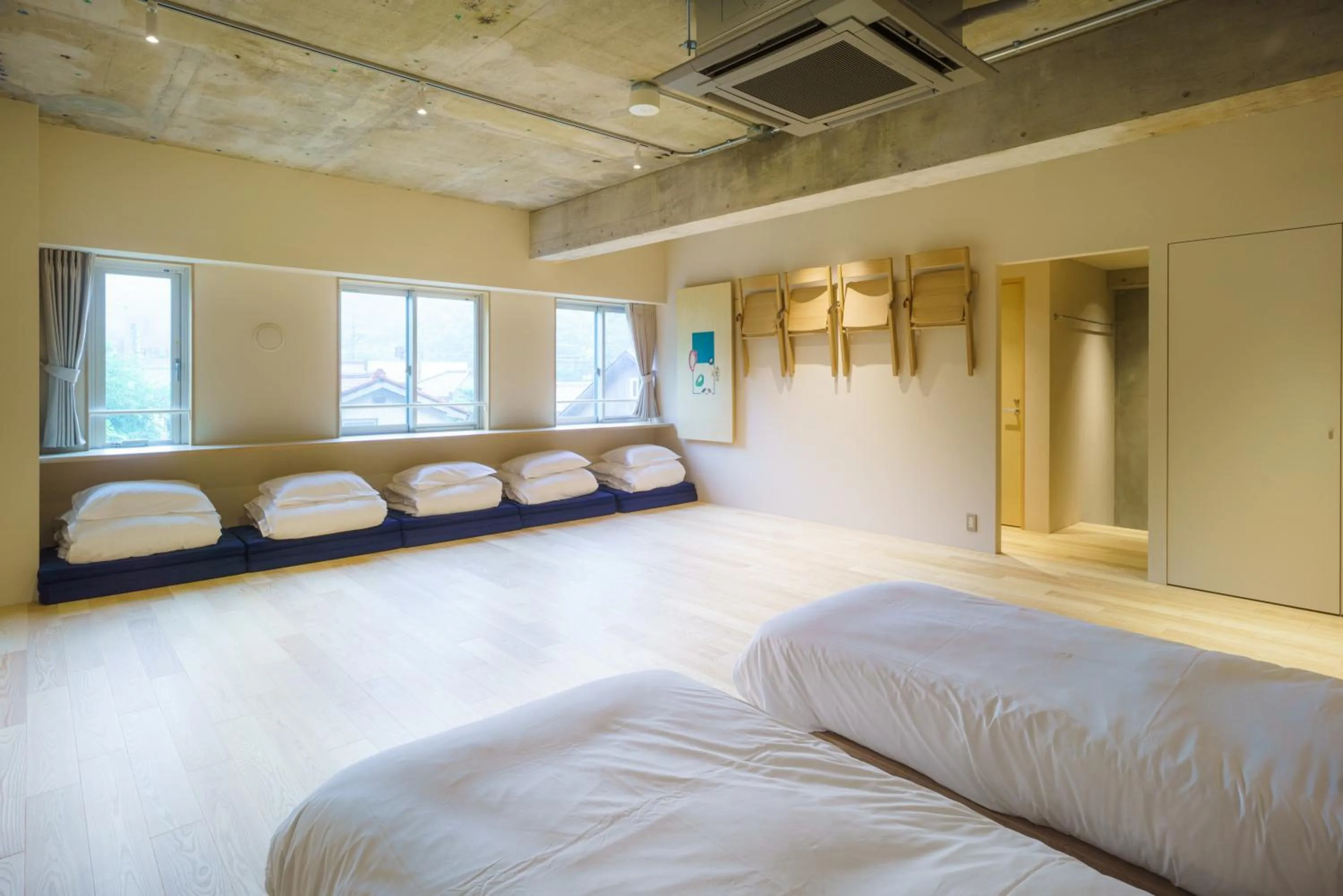 Bed in TAKAONE ACTIVITY＆STAY