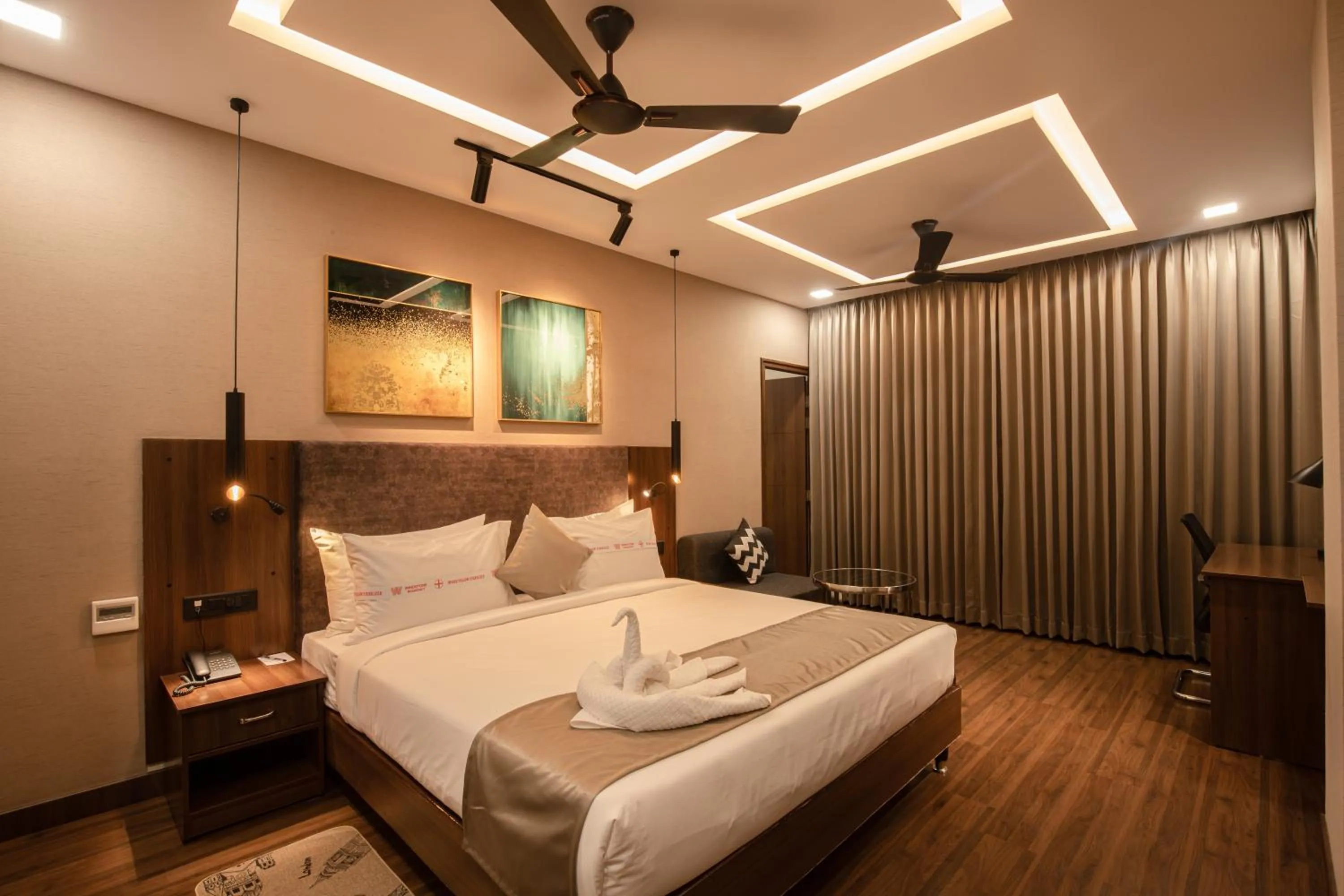 Photo of the whole room, Bed in Windstone Residency