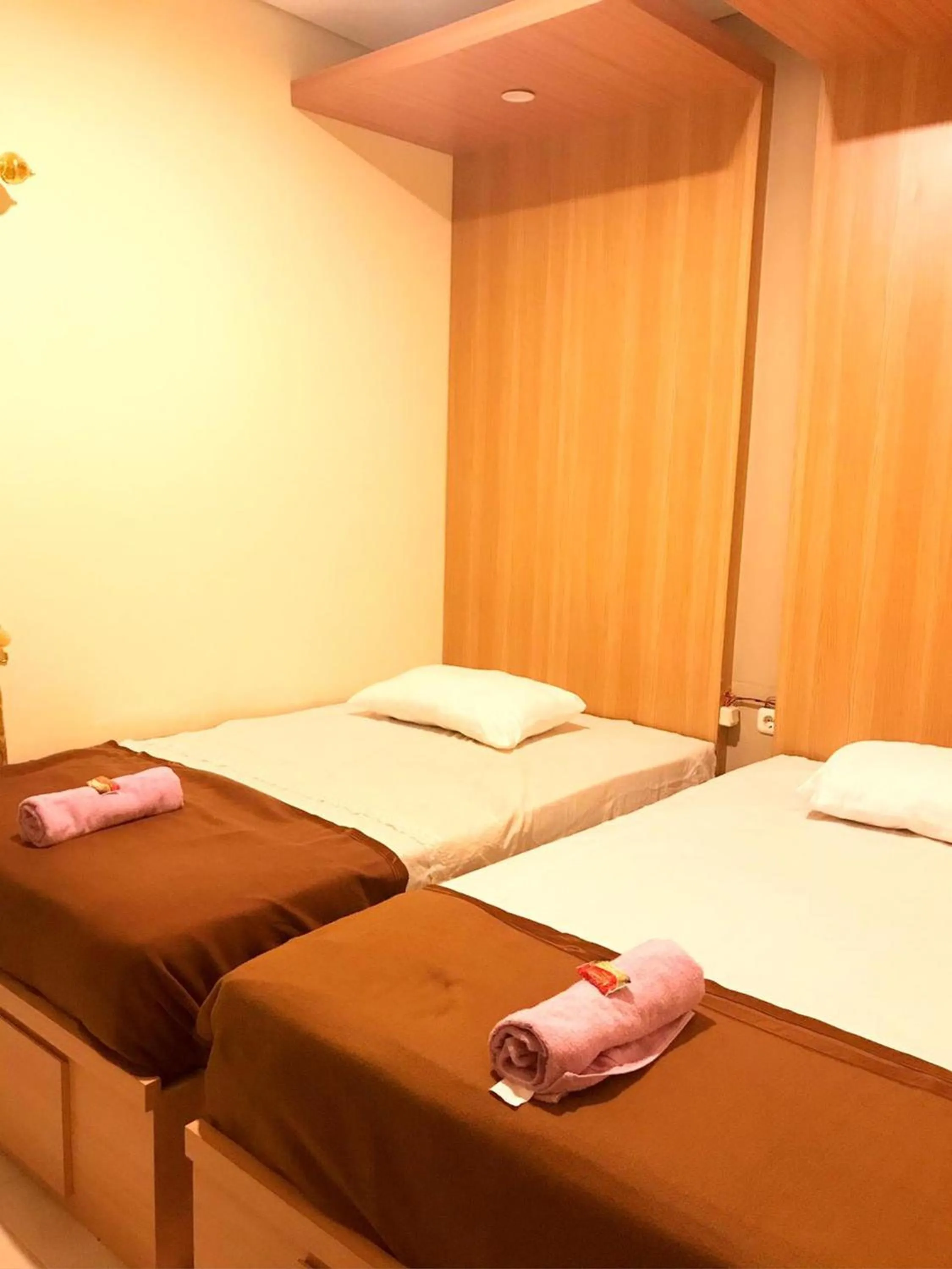 Bed in Kangen Yogya Homestay Malioboro Mitra RedDoorz