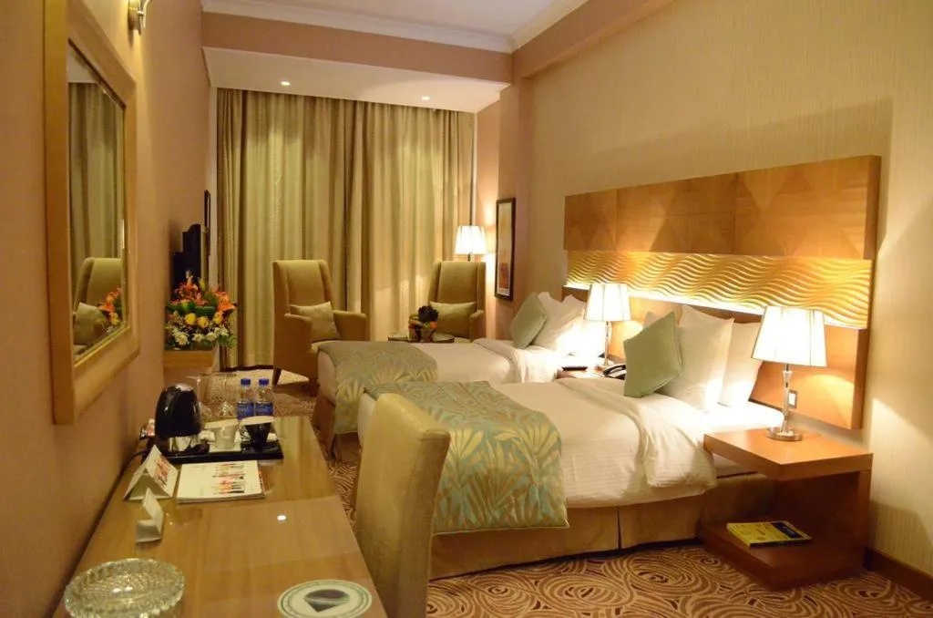 Bed in Coral Baghdad Hotel