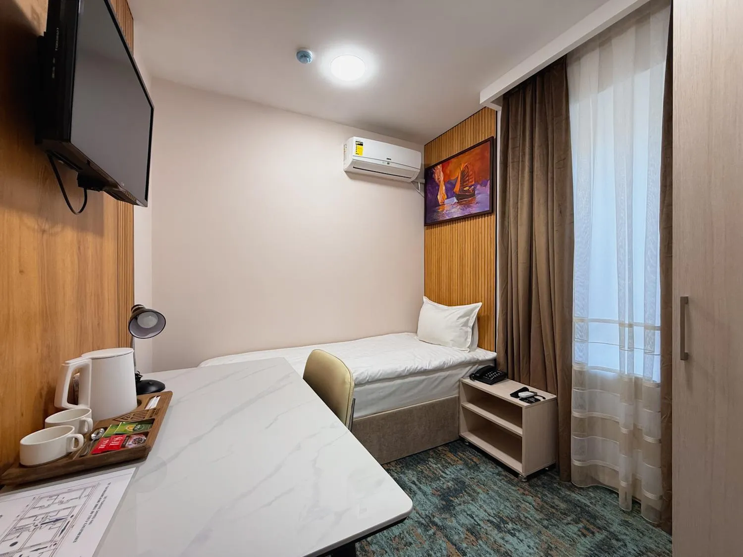 Bed in Musafir Hotel