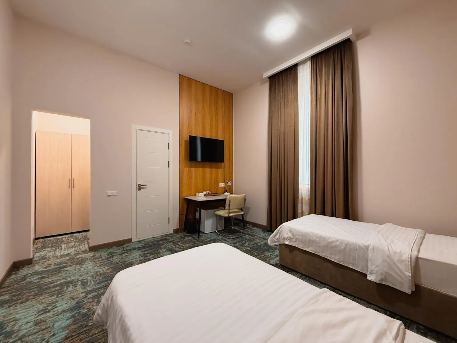 Bed in Musafir Hotel