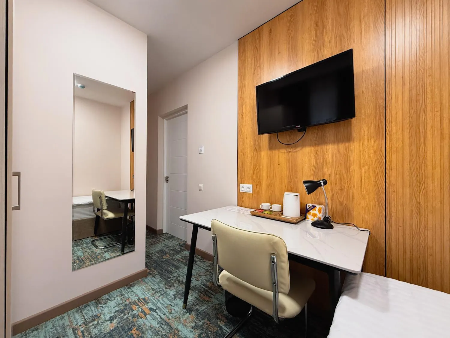 Bed in Musafir Hotel