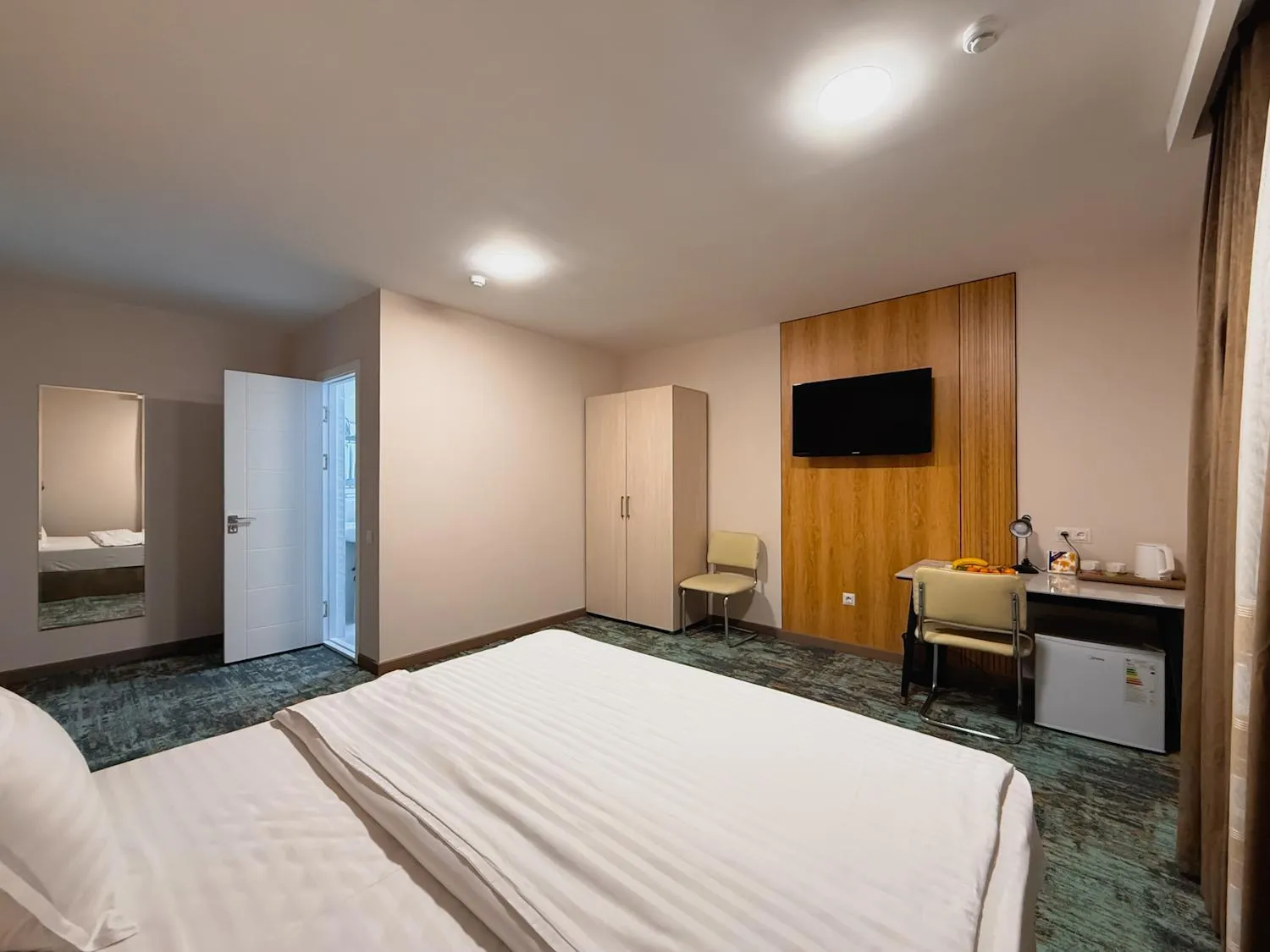 Bed in Musafir Hotel