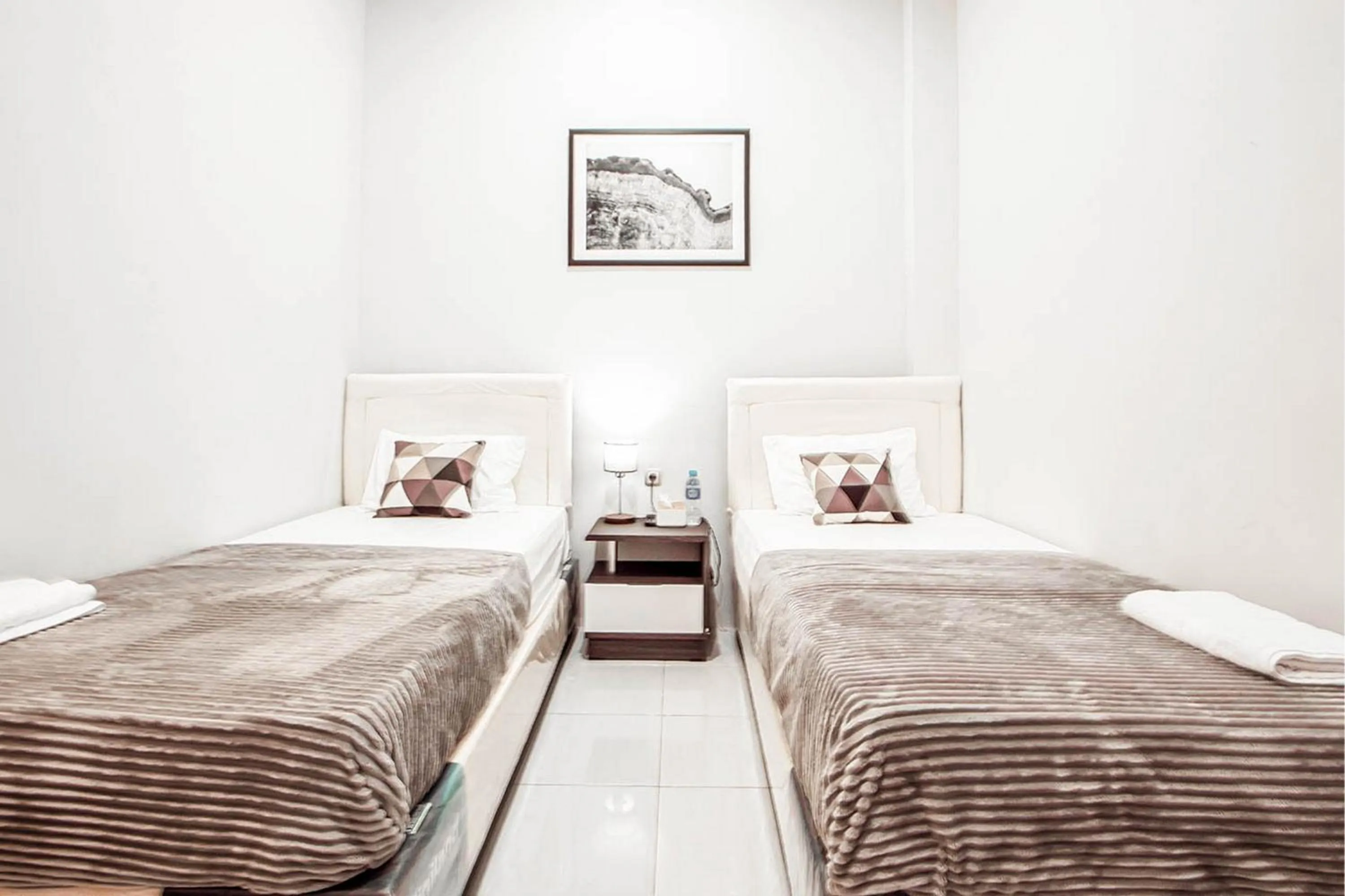 Bed in Krisan Guest House Syariah Banjarbaru Mitra RedDoorz