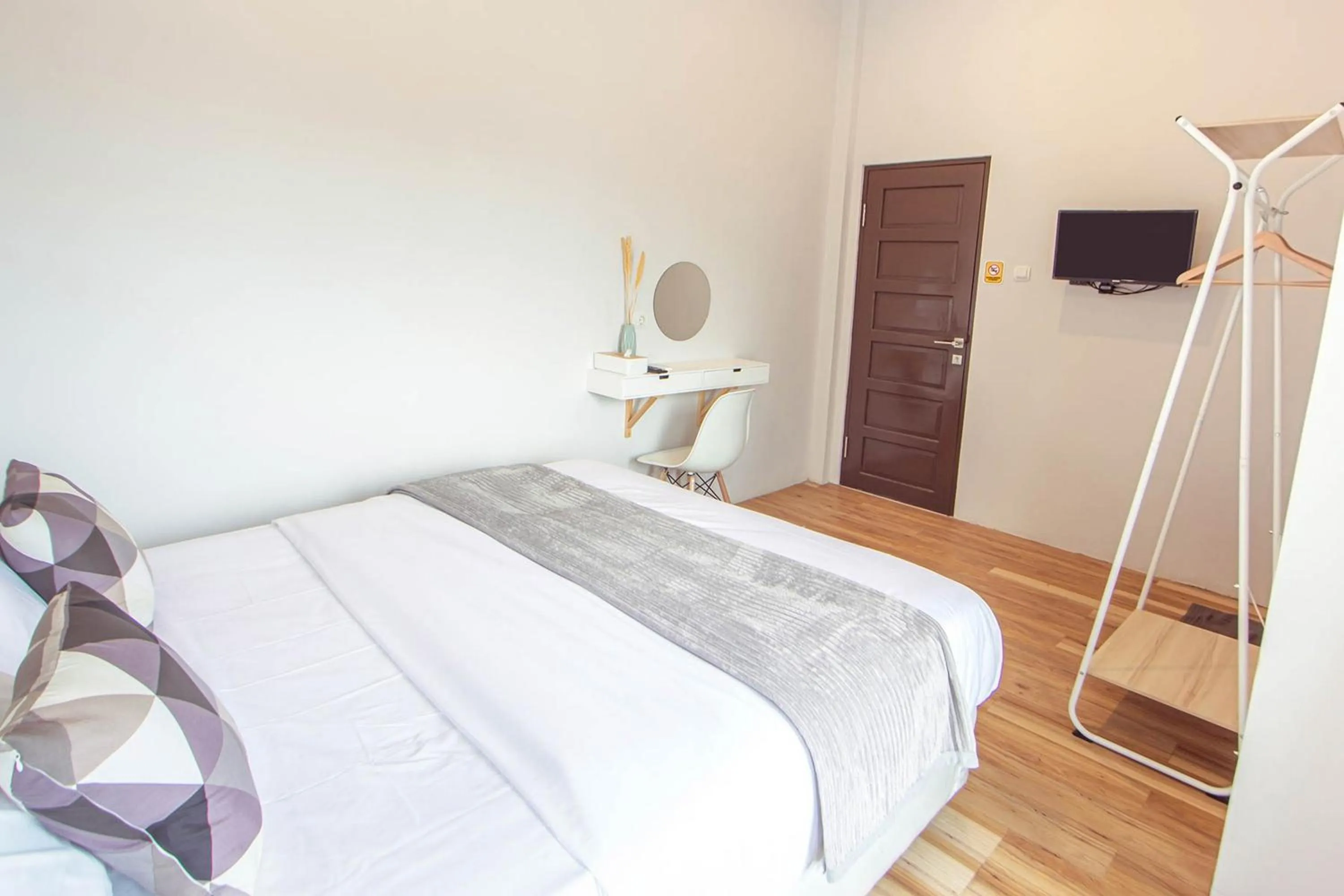 Bed in Krisan Guest House Syariah Banjarbaru Mitra RedDoorz