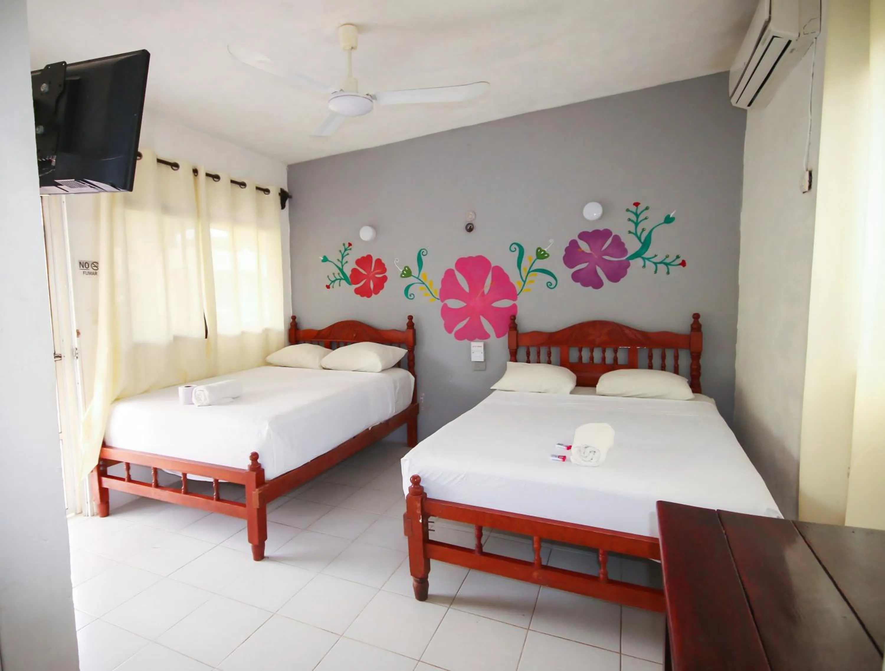 Bed in Hotel Los Arcos Holbox