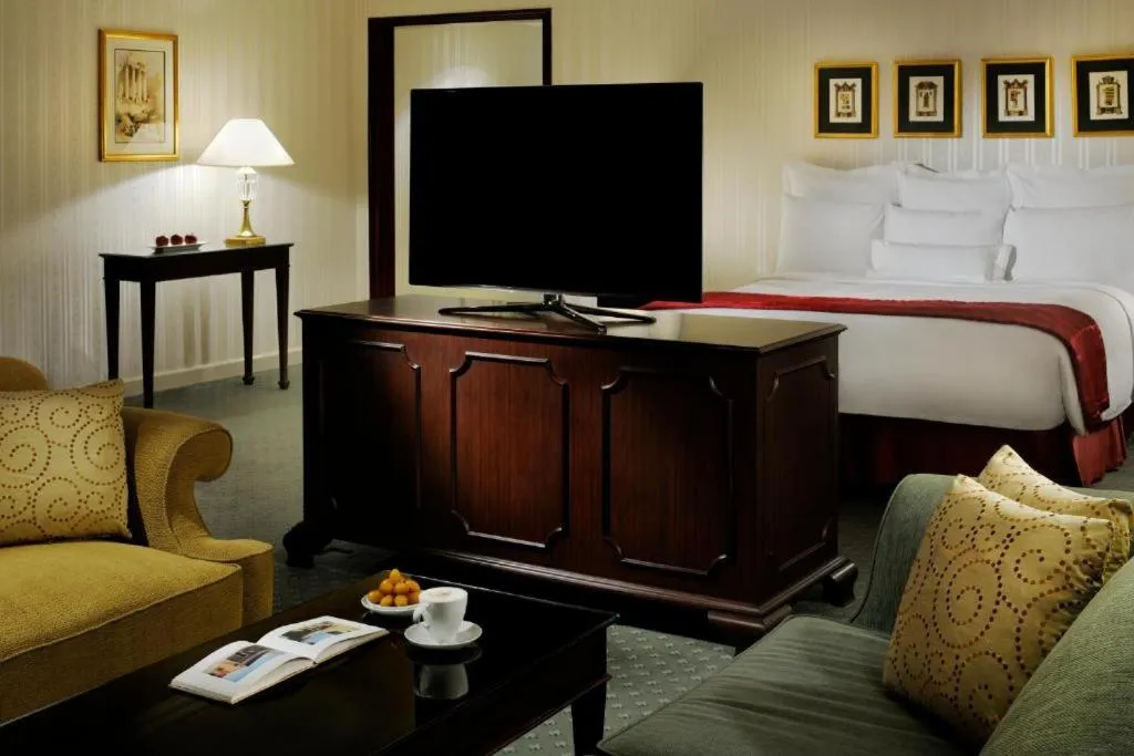 Bedroom in The Bristol Hotel by Royal Orchid Hotel Management