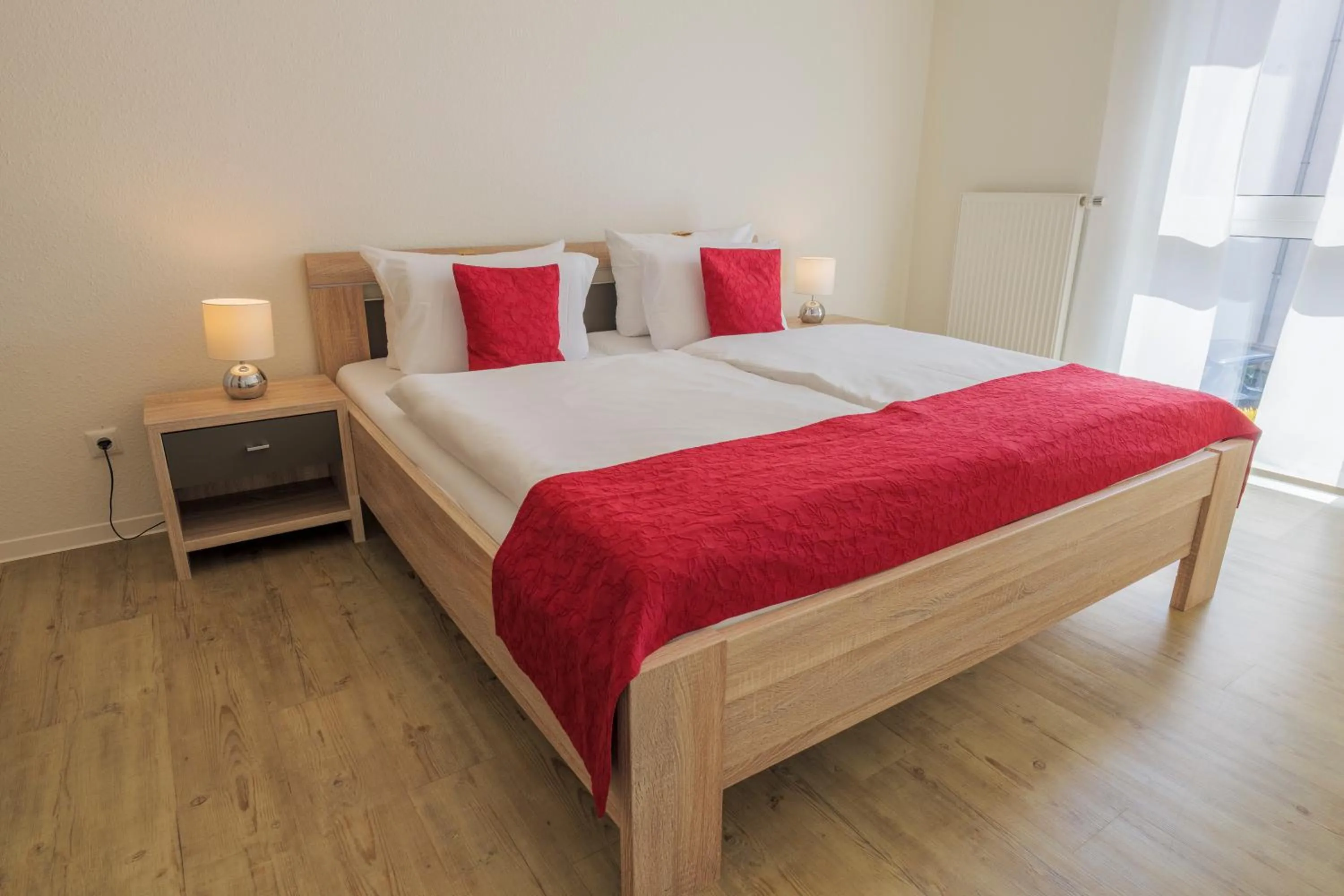 Photo of the whole room, Bed in Hotel Hafen Büsum