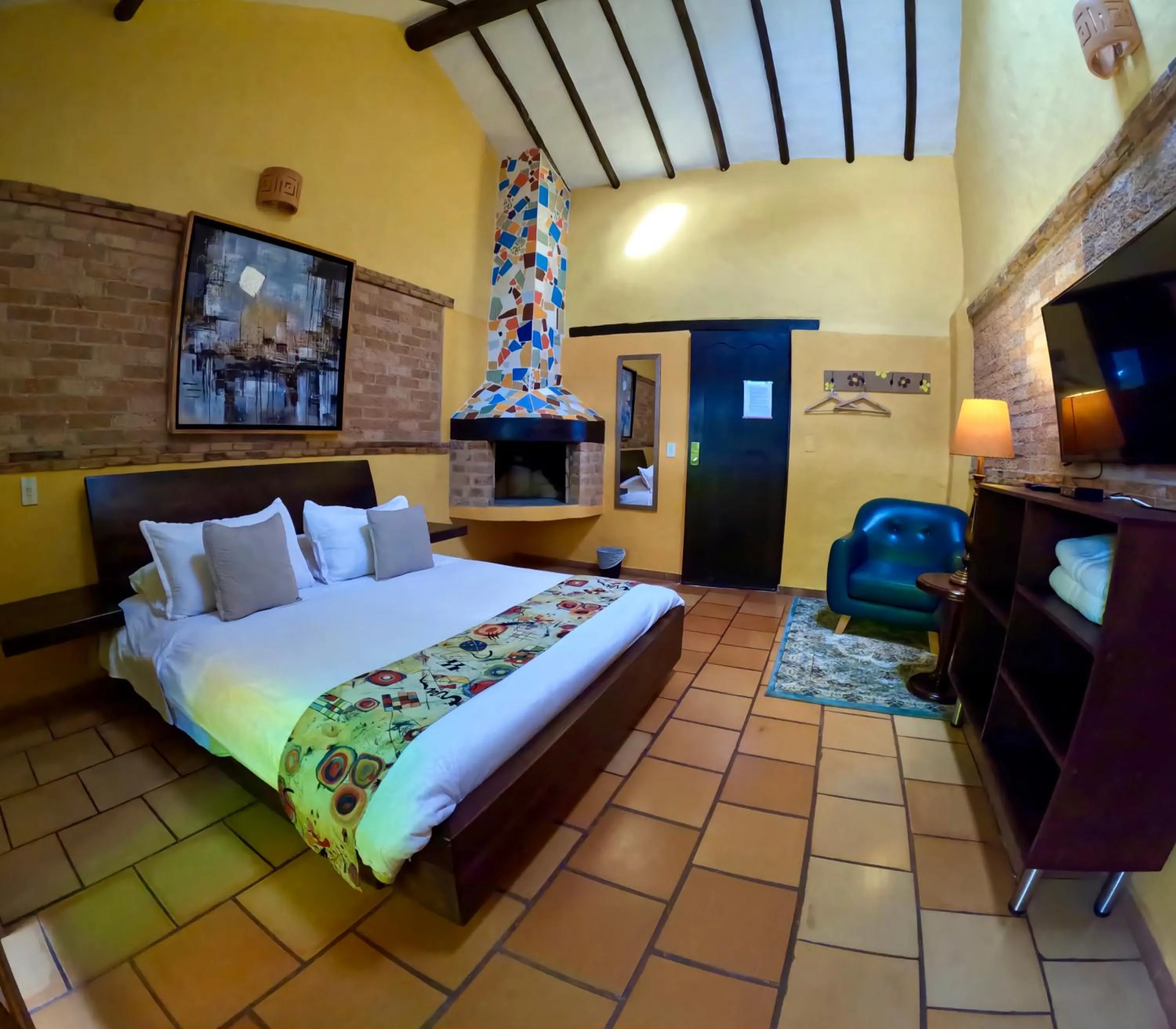 View (from property/room), Bed in Bombon Hotel