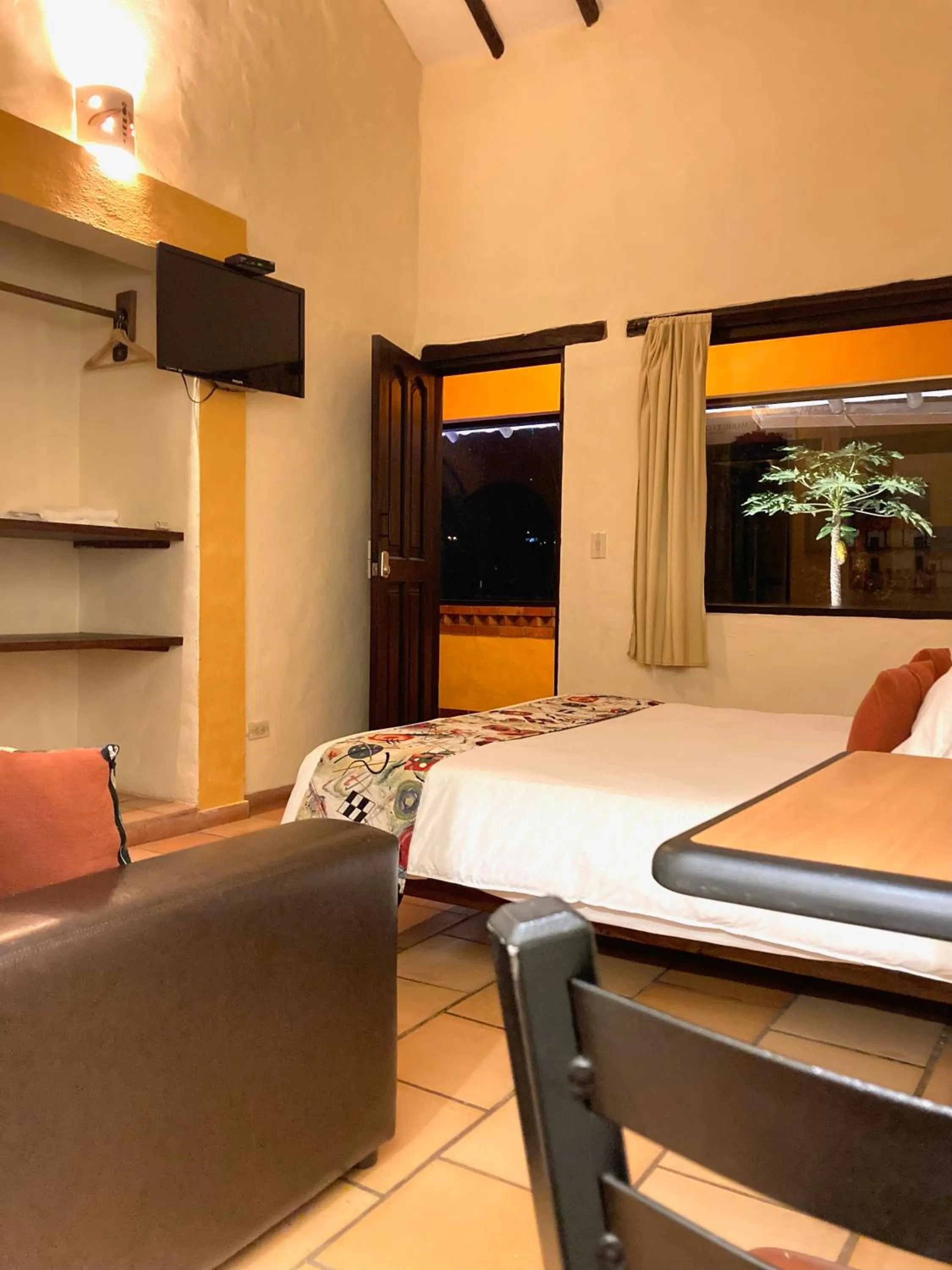 Photo of the whole room, Bed in Bombon Hotel