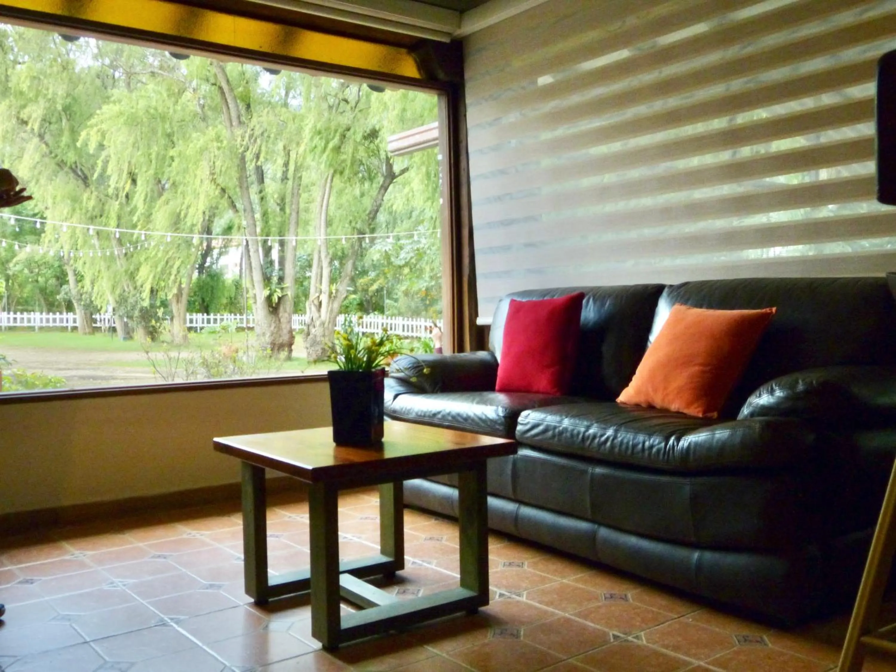 Seating area in Bombon Hotel