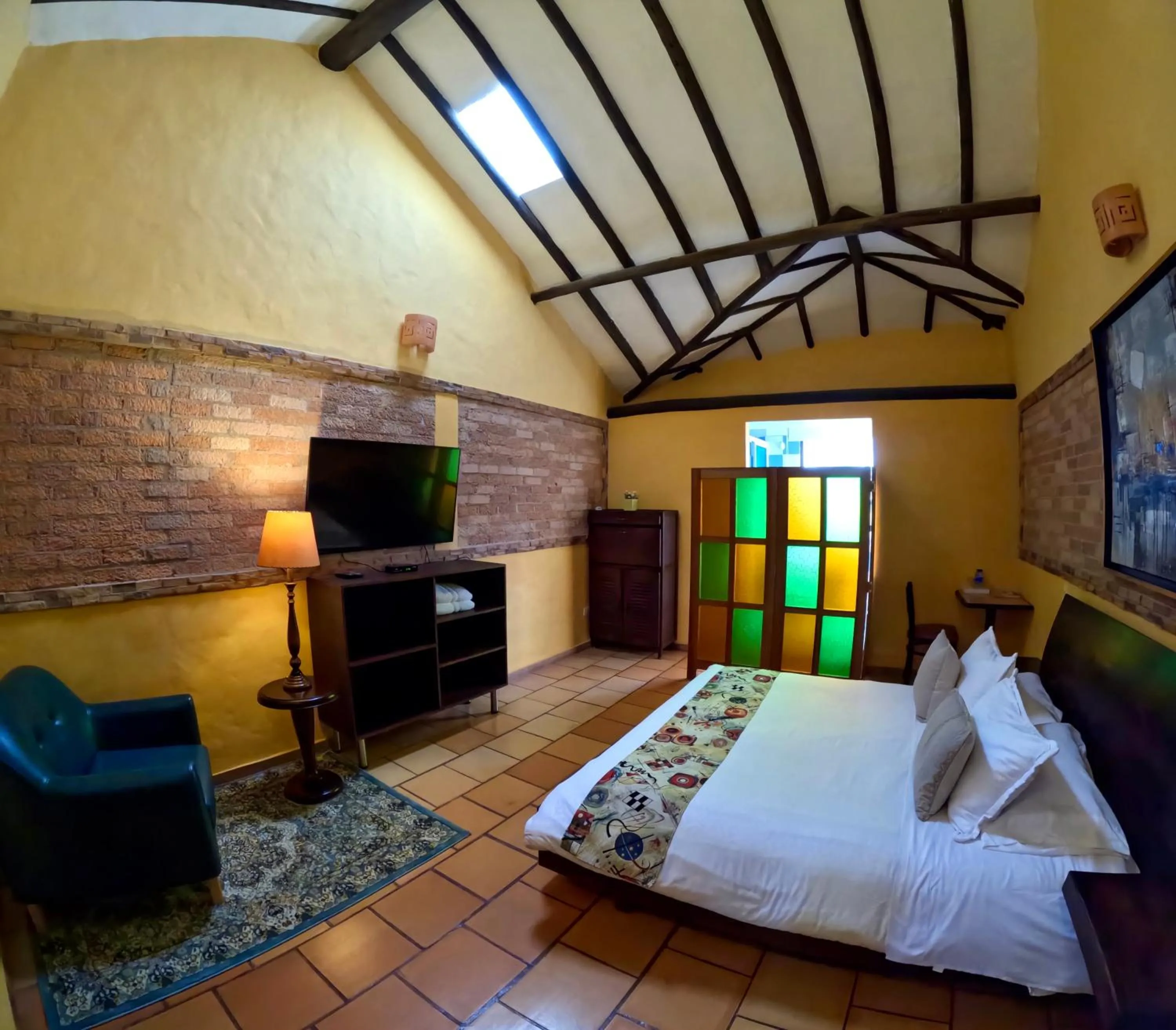 View (from property/room), Bed in Bombon Hotel