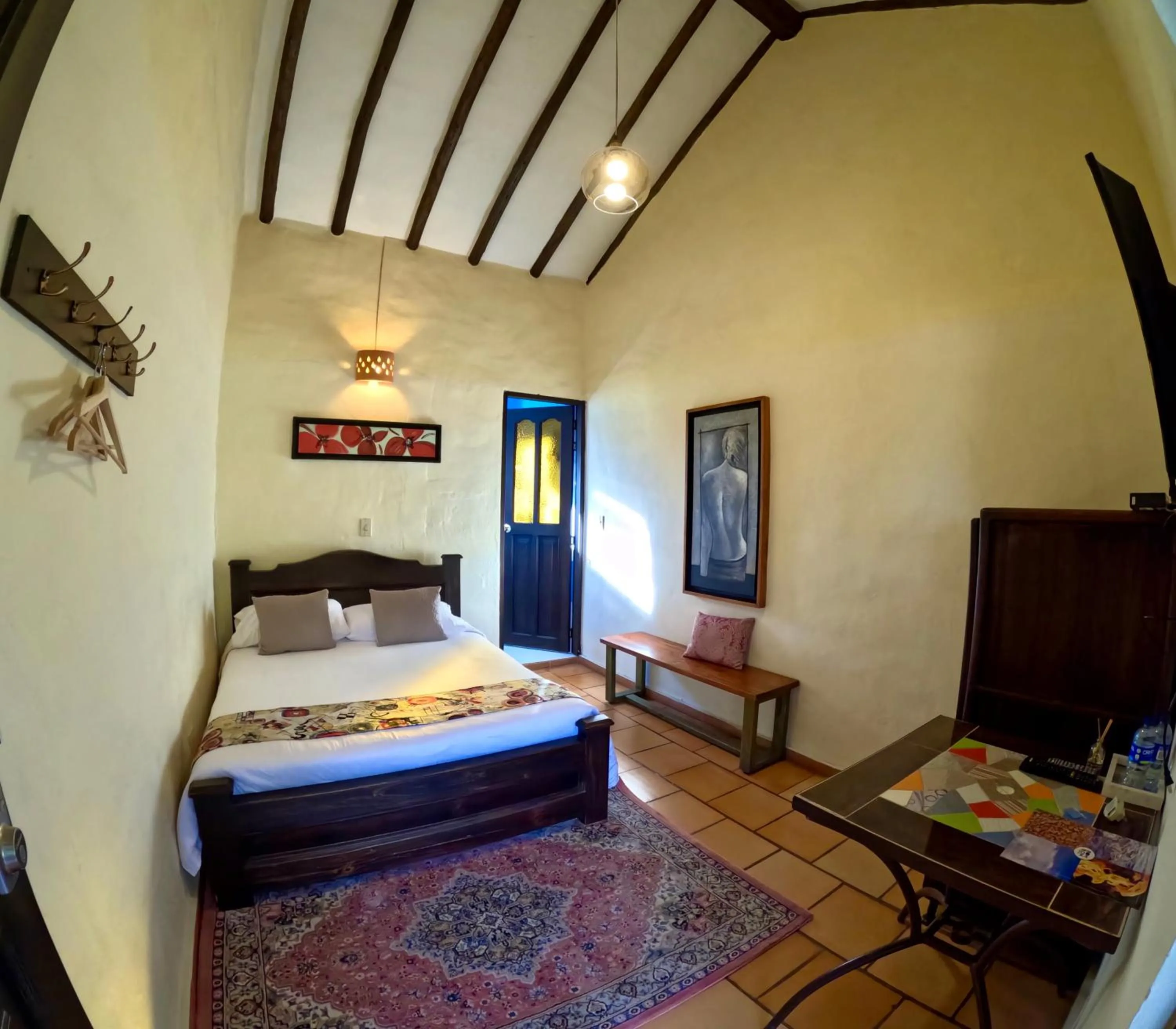 View (from property/room), Bed in Bombon Hotel