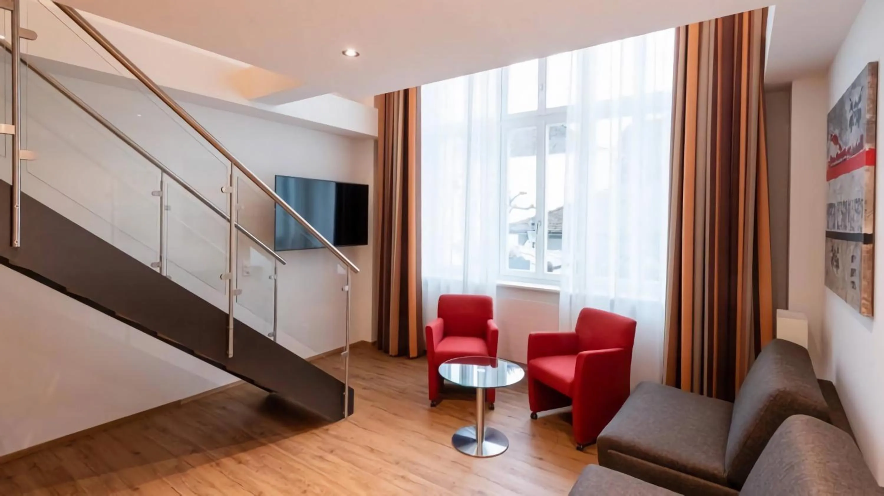 TV and multimedia in Central City Hotel Rochat