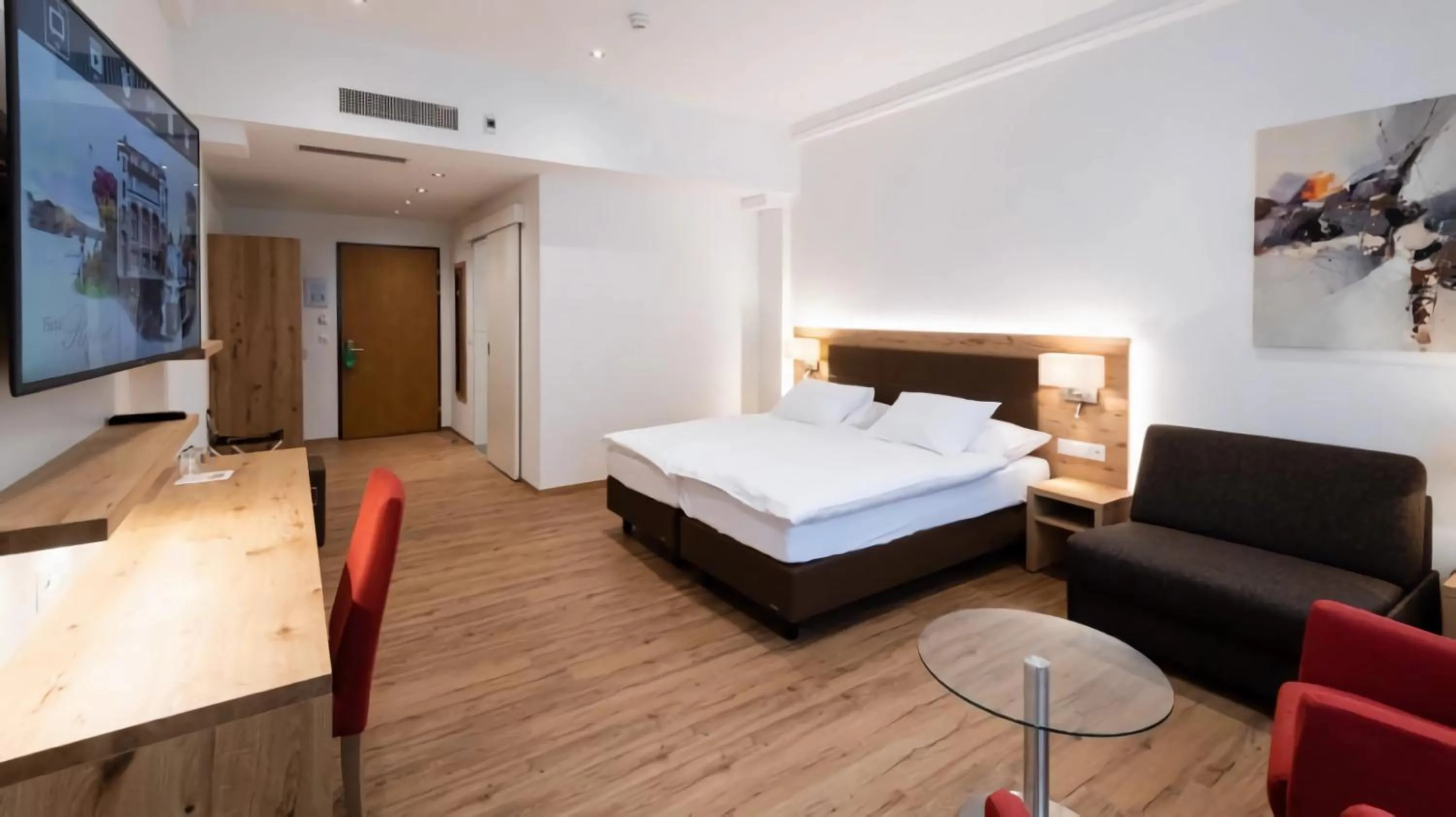 Bed in Central City Hotel Rochat