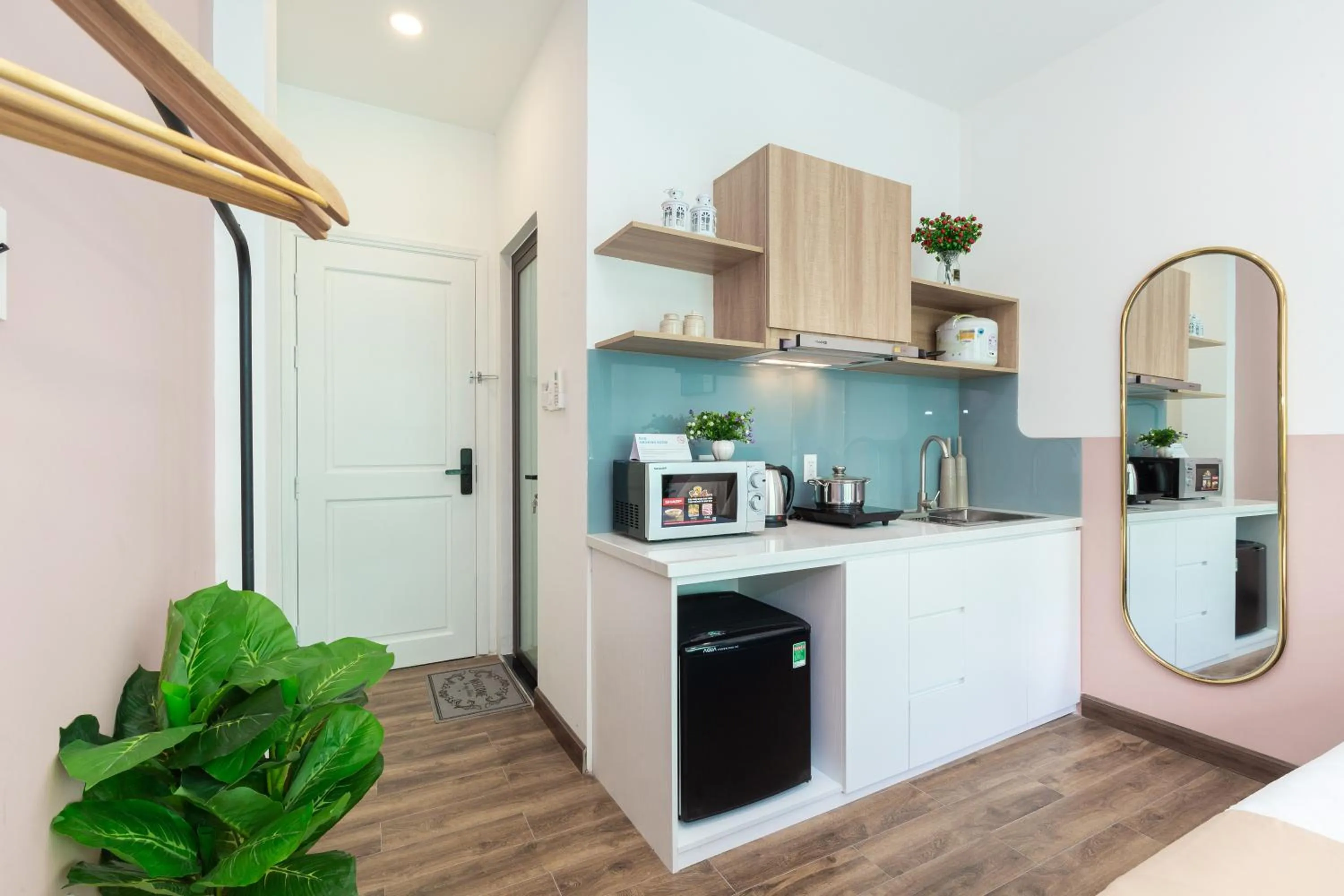 Kitchen or kitchenette in Cozrum Homes Greena House