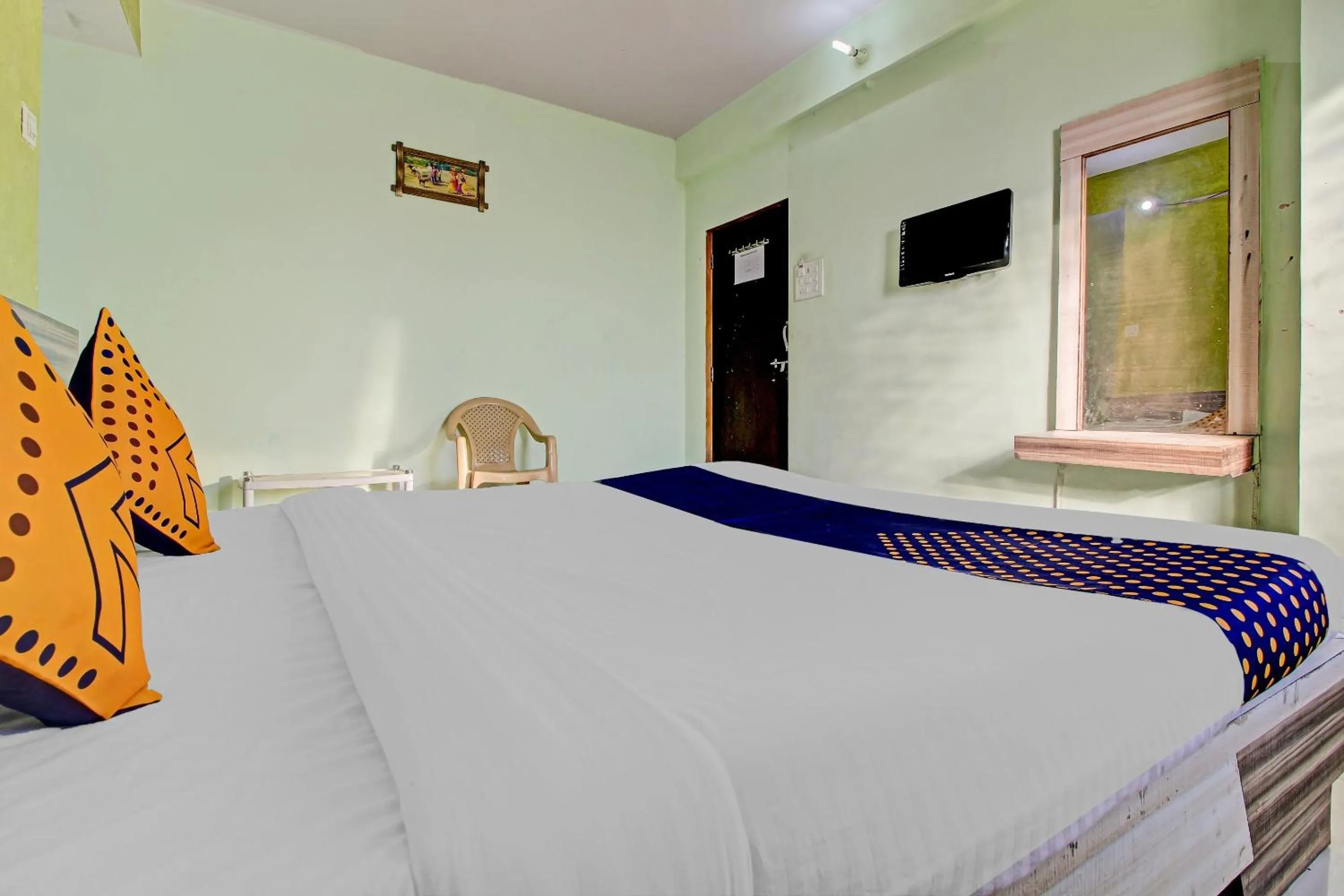 Bedroom in SPOT ON Shreekrupa