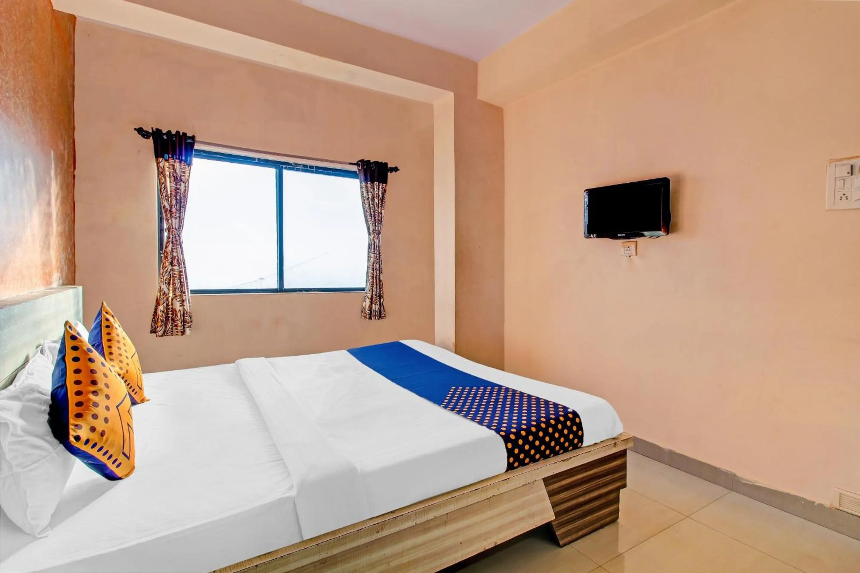 Bedroom in SPOT ON Shreekrupa