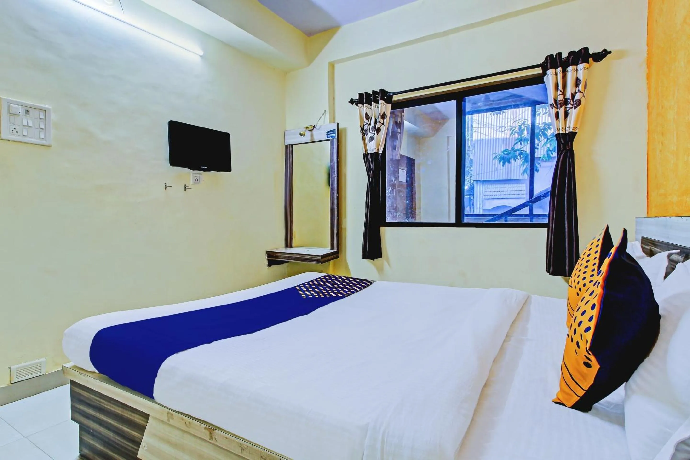 Bedroom in SPOT ON Shreekrupa